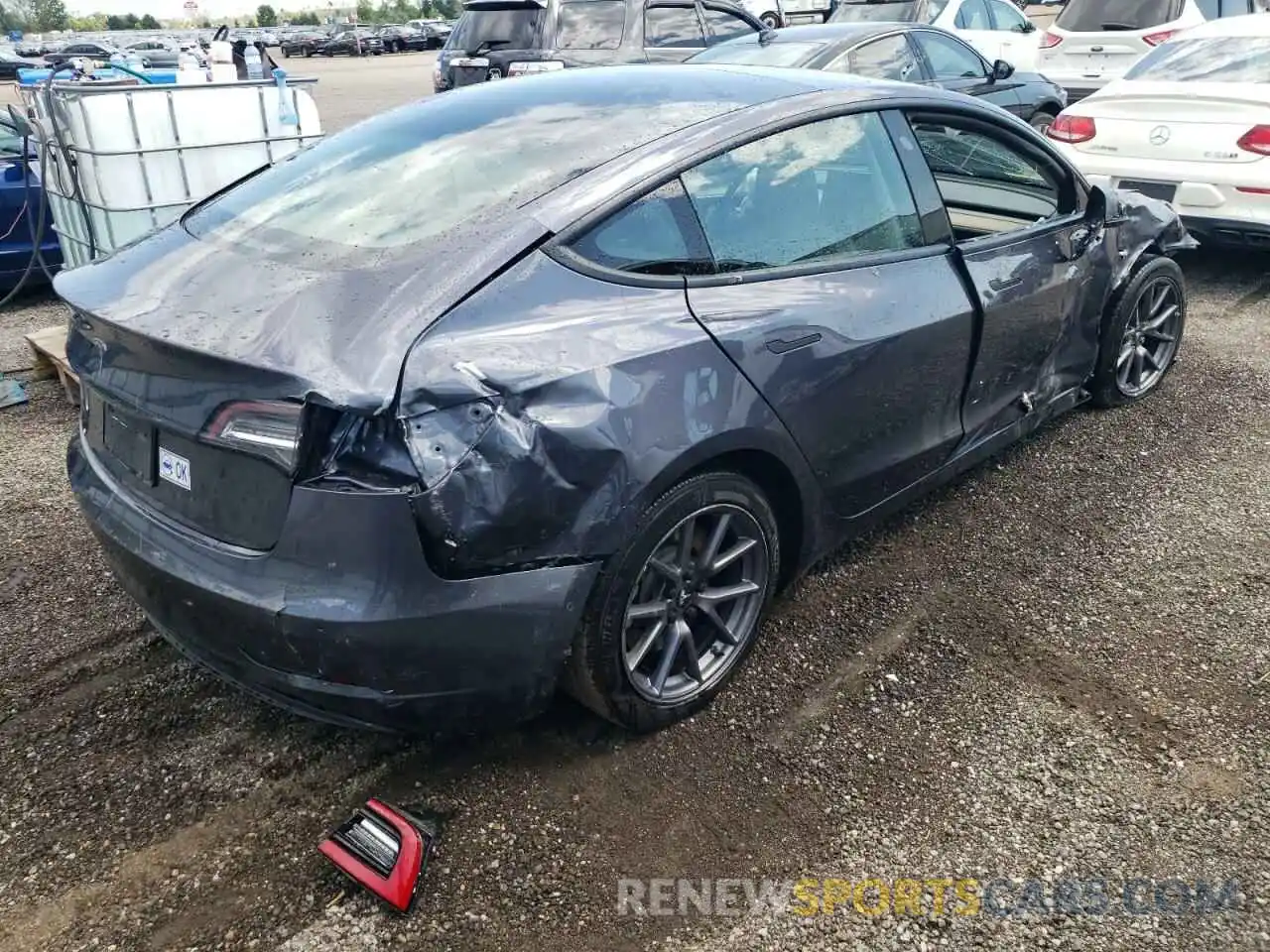 4 Photograph of a damaged car 5YJ3E1EA1MF015815 TESLA MODEL 3 2021