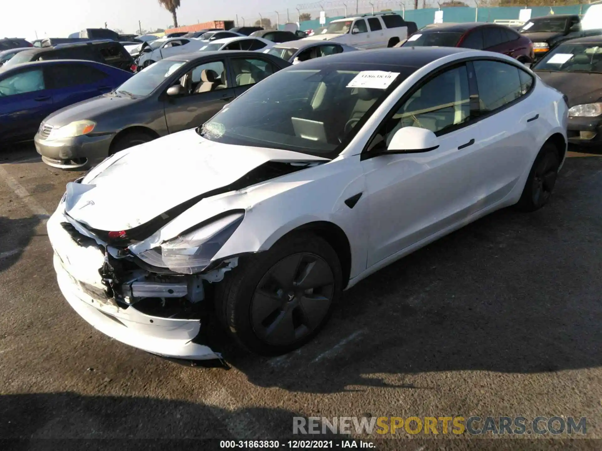 2 Photograph of a damaged car 5YJ3E1EA1MF057966 TESLA MODEL 3 2021