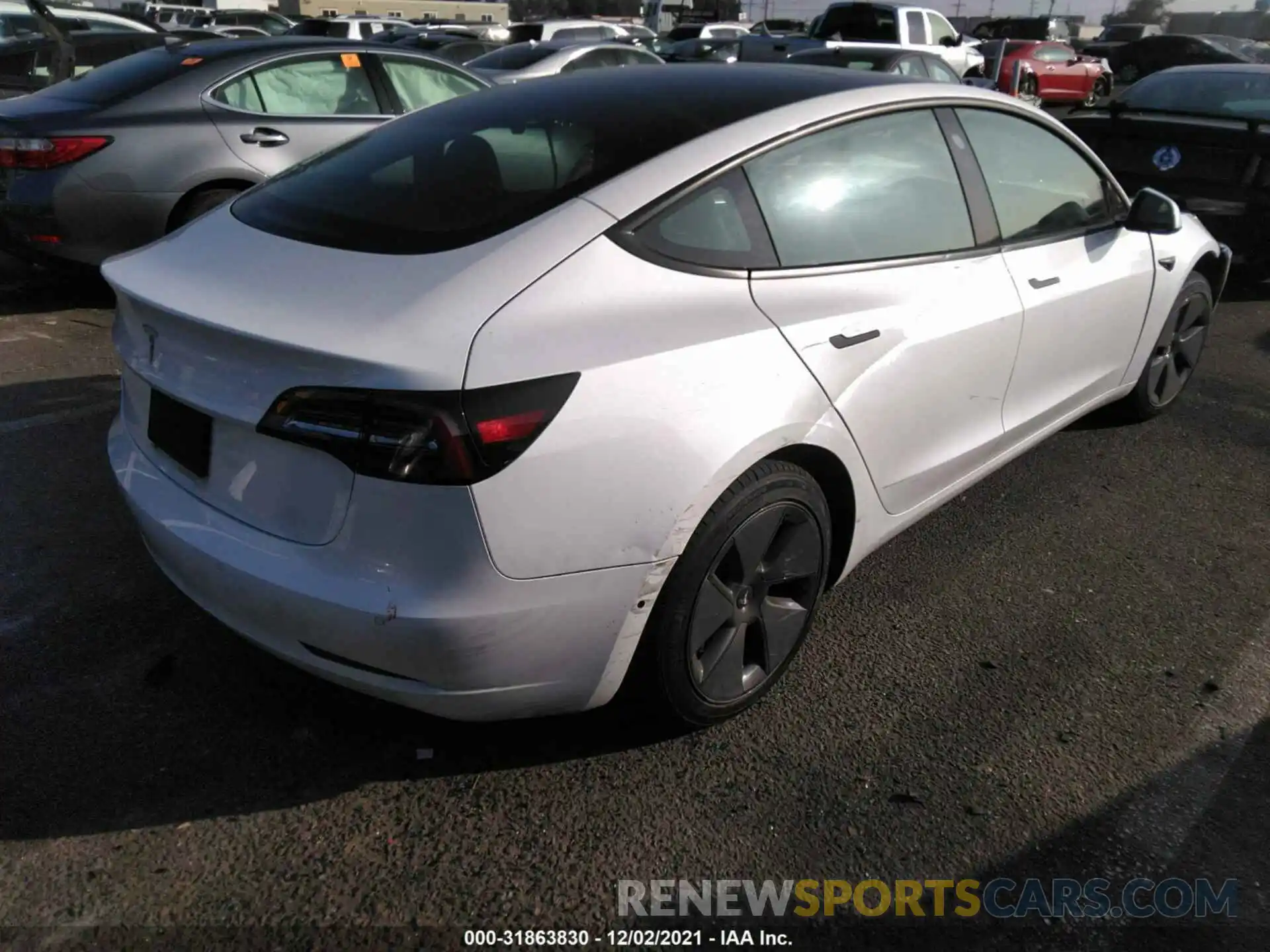 4 Photograph of a damaged car 5YJ3E1EA1MF057966 TESLA MODEL 3 2021