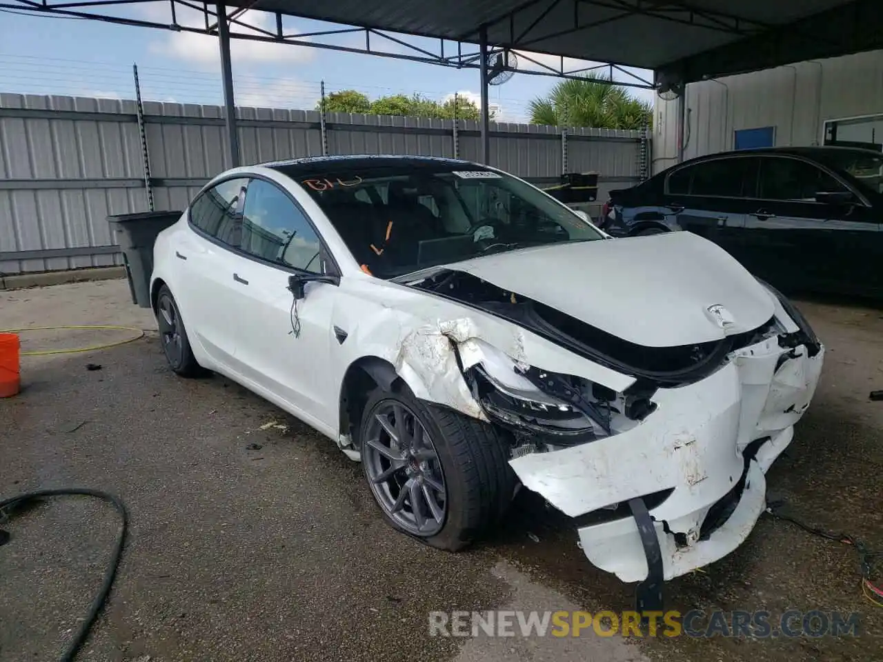 1 Photograph of a damaged car 5YJ3E1EA1MF090417 TESLA MODEL 3 2021