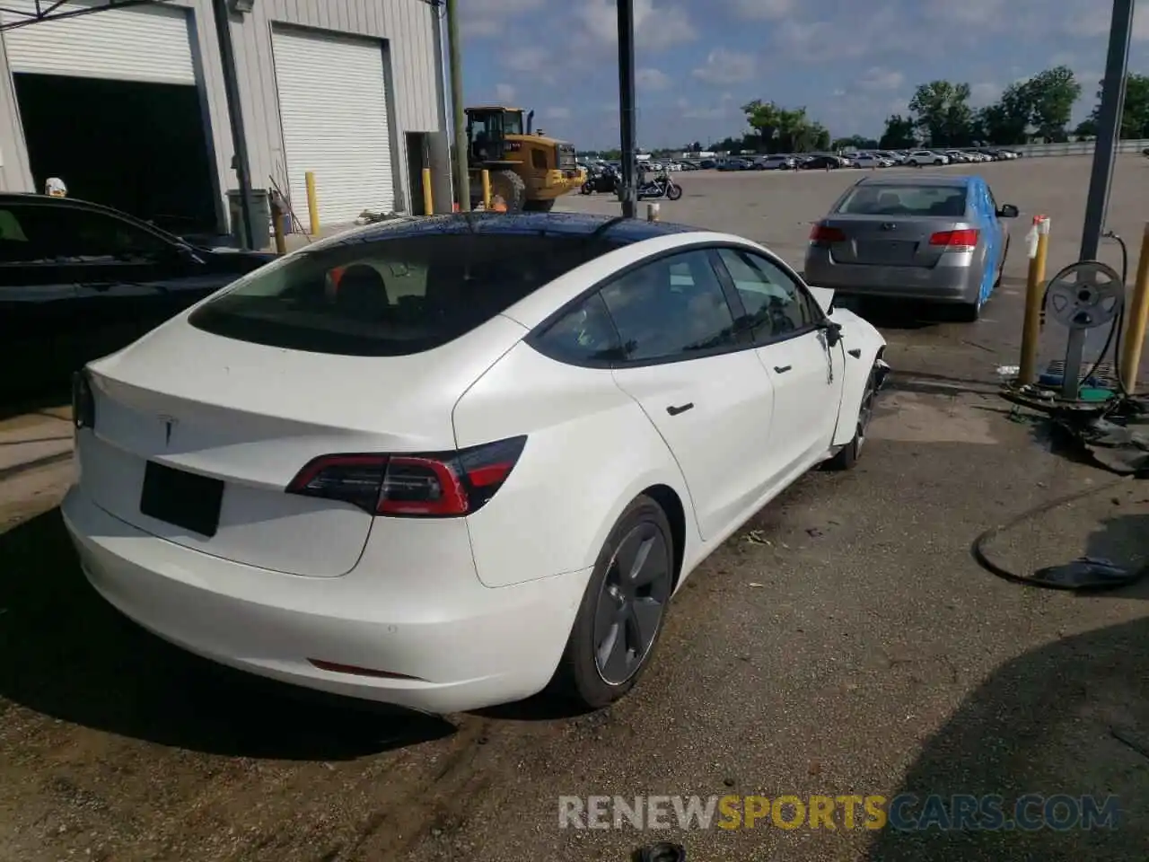 4 Photograph of a damaged car 5YJ3E1EA1MF090417 TESLA MODEL 3 2021