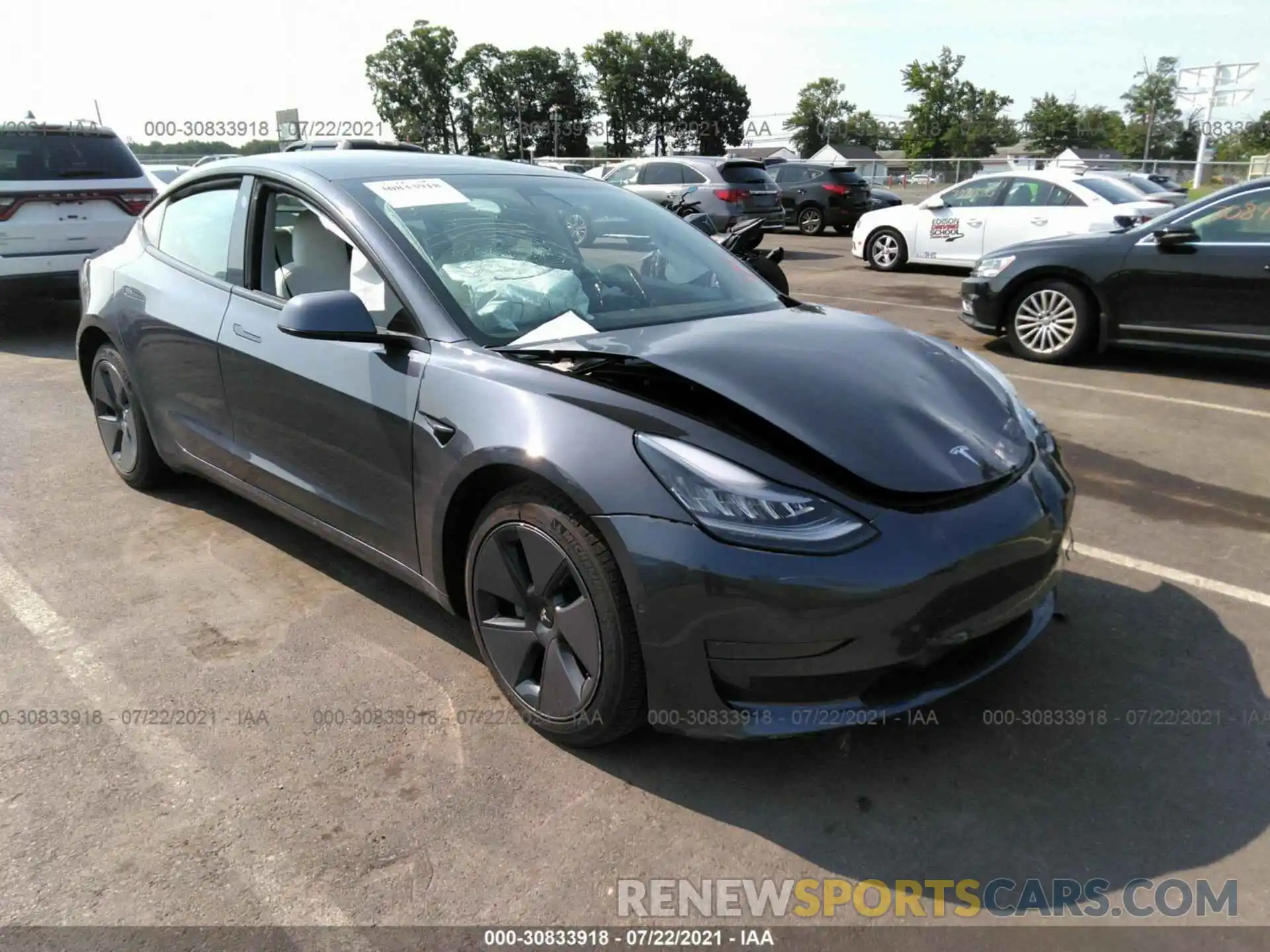 1 Photograph of a damaged car 5YJ3E1EA1MF849082 TESLA MODEL 3 2021