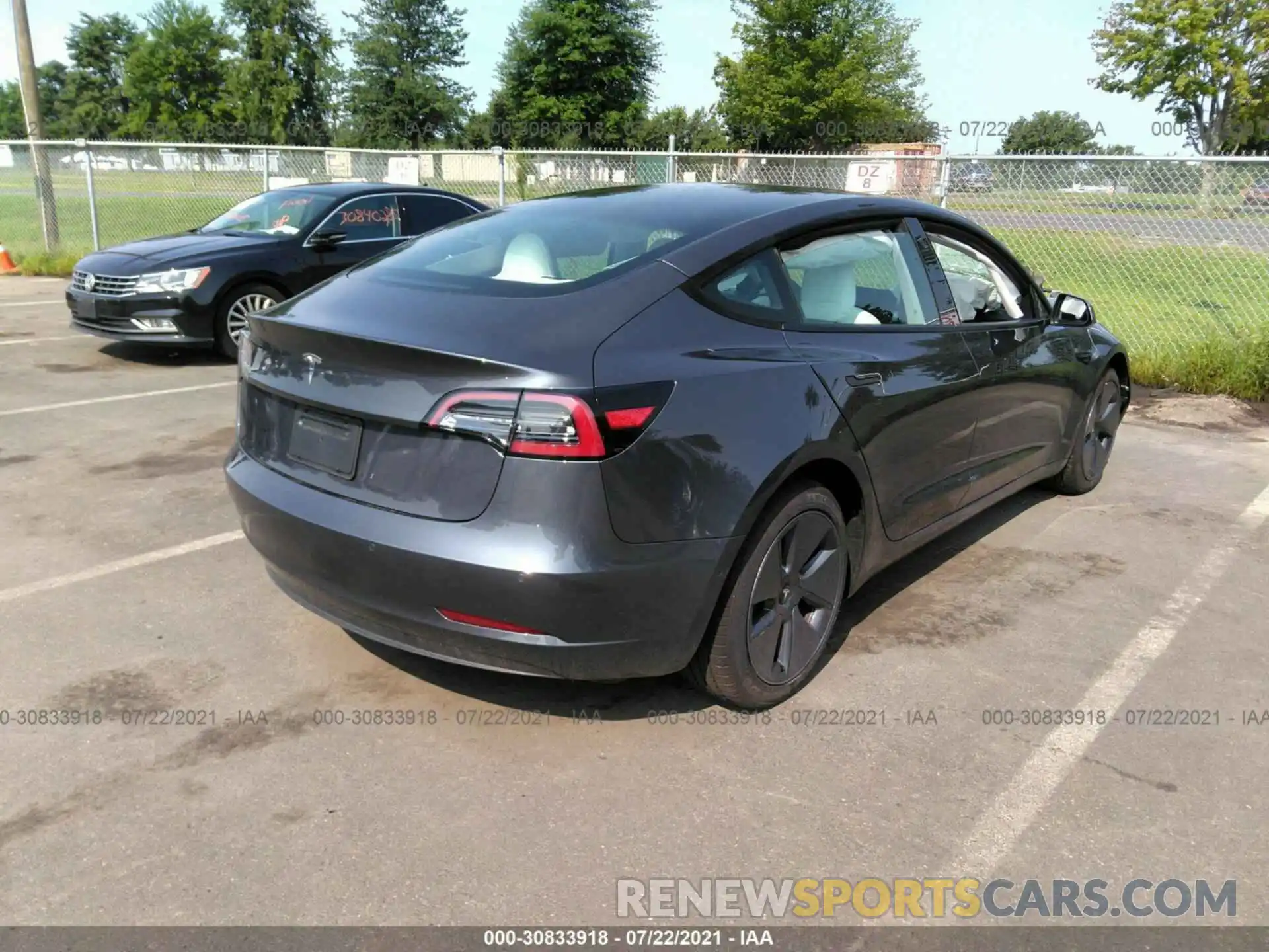 4 Photograph of a damaged car 5YJ3E1EA1MF849082 TESLA MODEL 3 2021