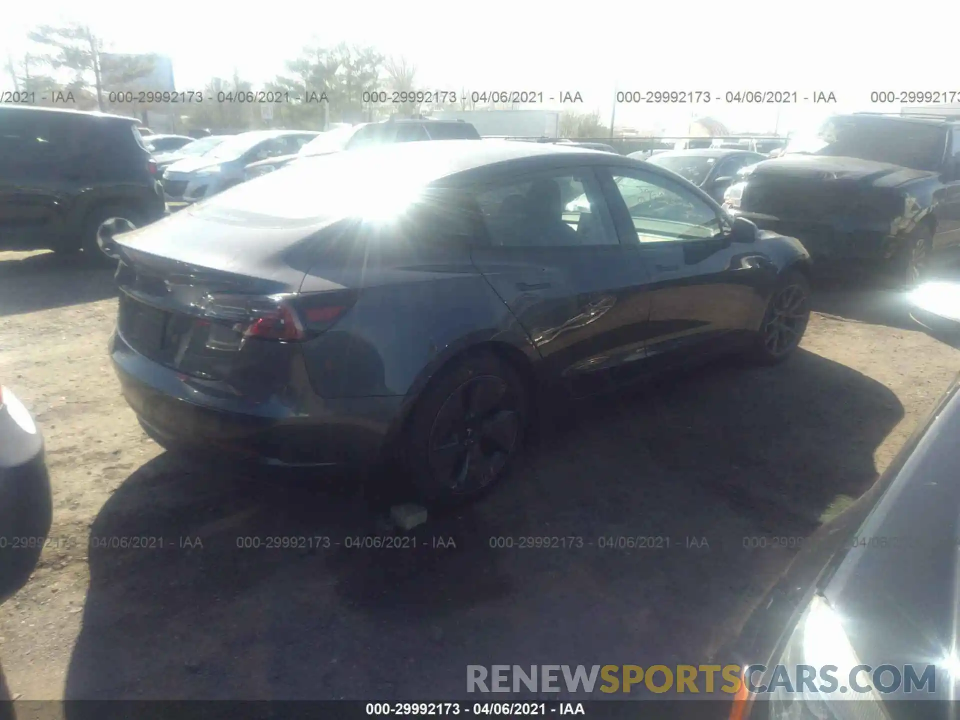 4 Photograph of a damaged car 5YJ3E1EA1MF854038 TESLA MODEL 3 2021