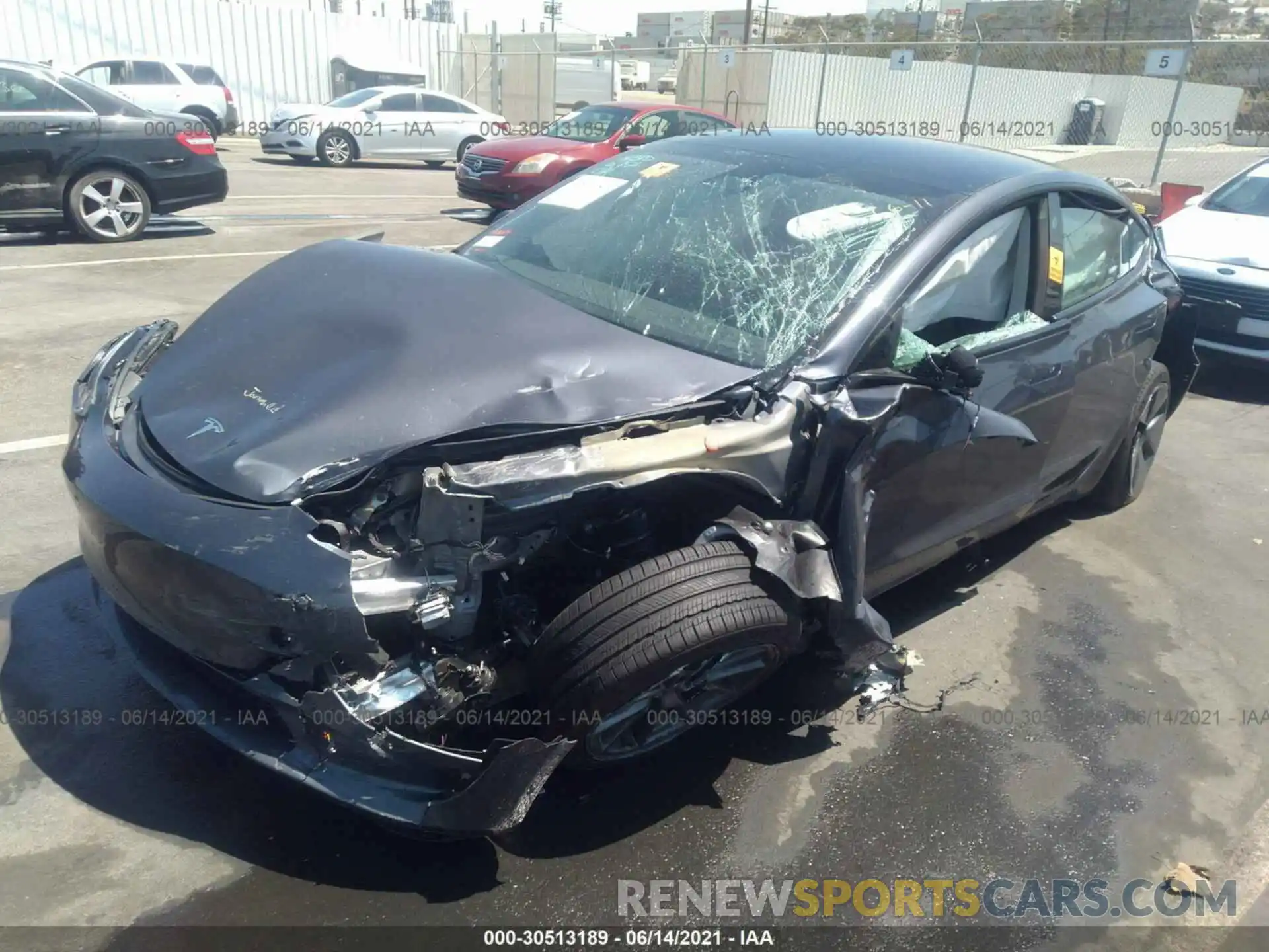 2 Photograph of a damaged car 5YJ3E1EA1MF872975 TESLA MODEL 3 2021