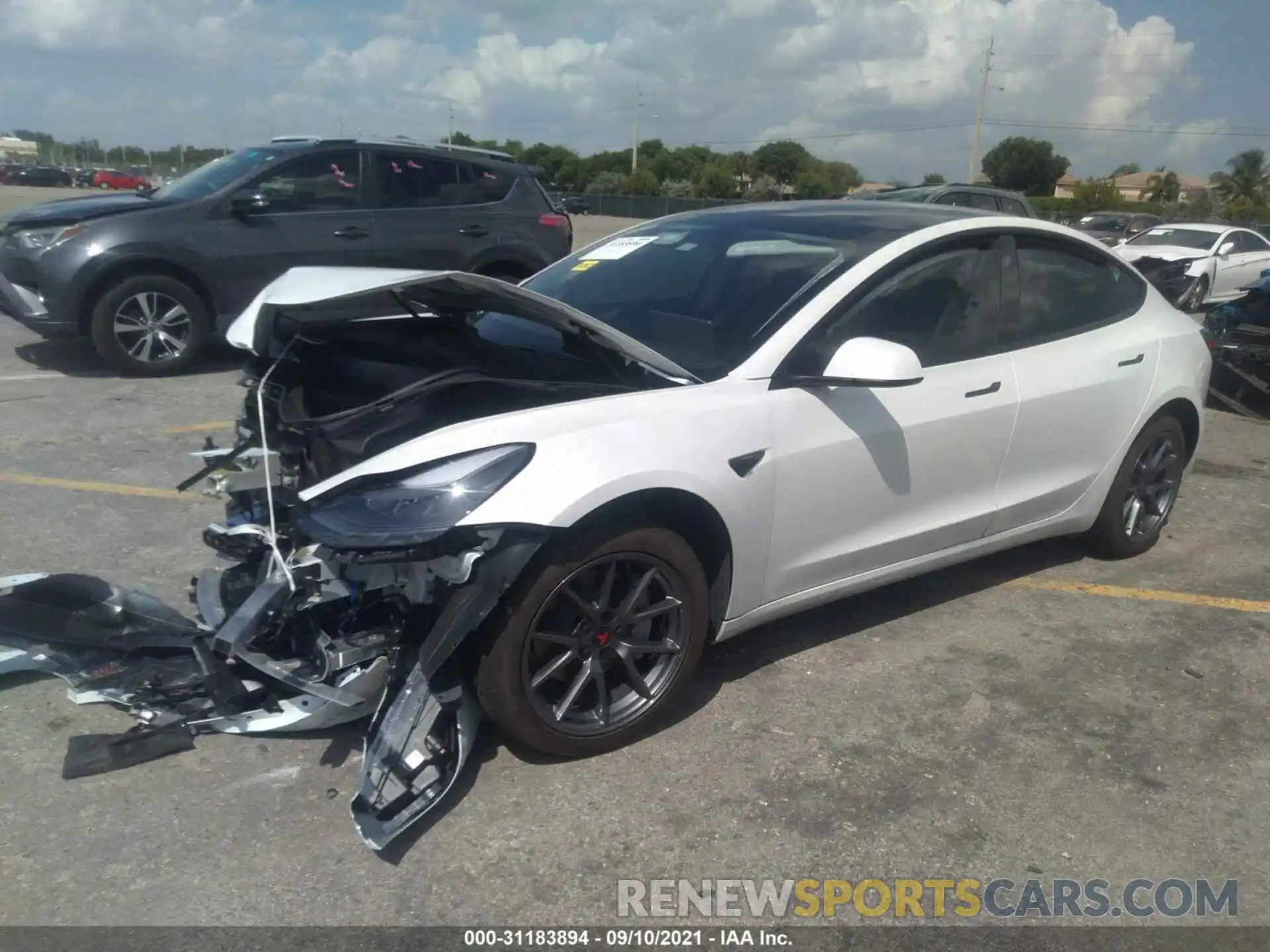 2 Photograph of a damaged car 5YJ3E1EA1MF907935 TESLA MODEL 3 2021