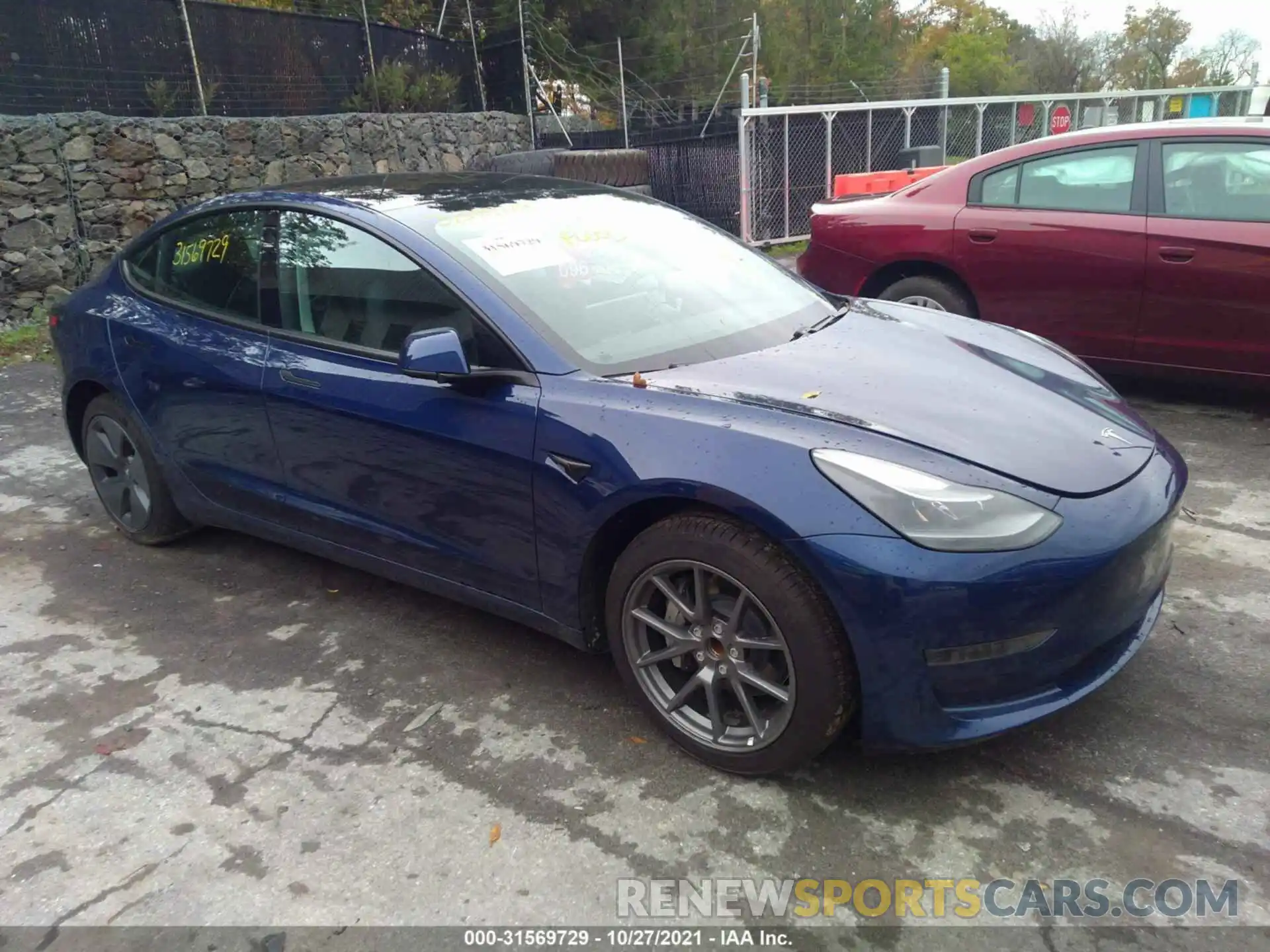 1 Photograph of a damaged car 5YJ3E1EA1MF922161 TESLA MODEL 3 2021