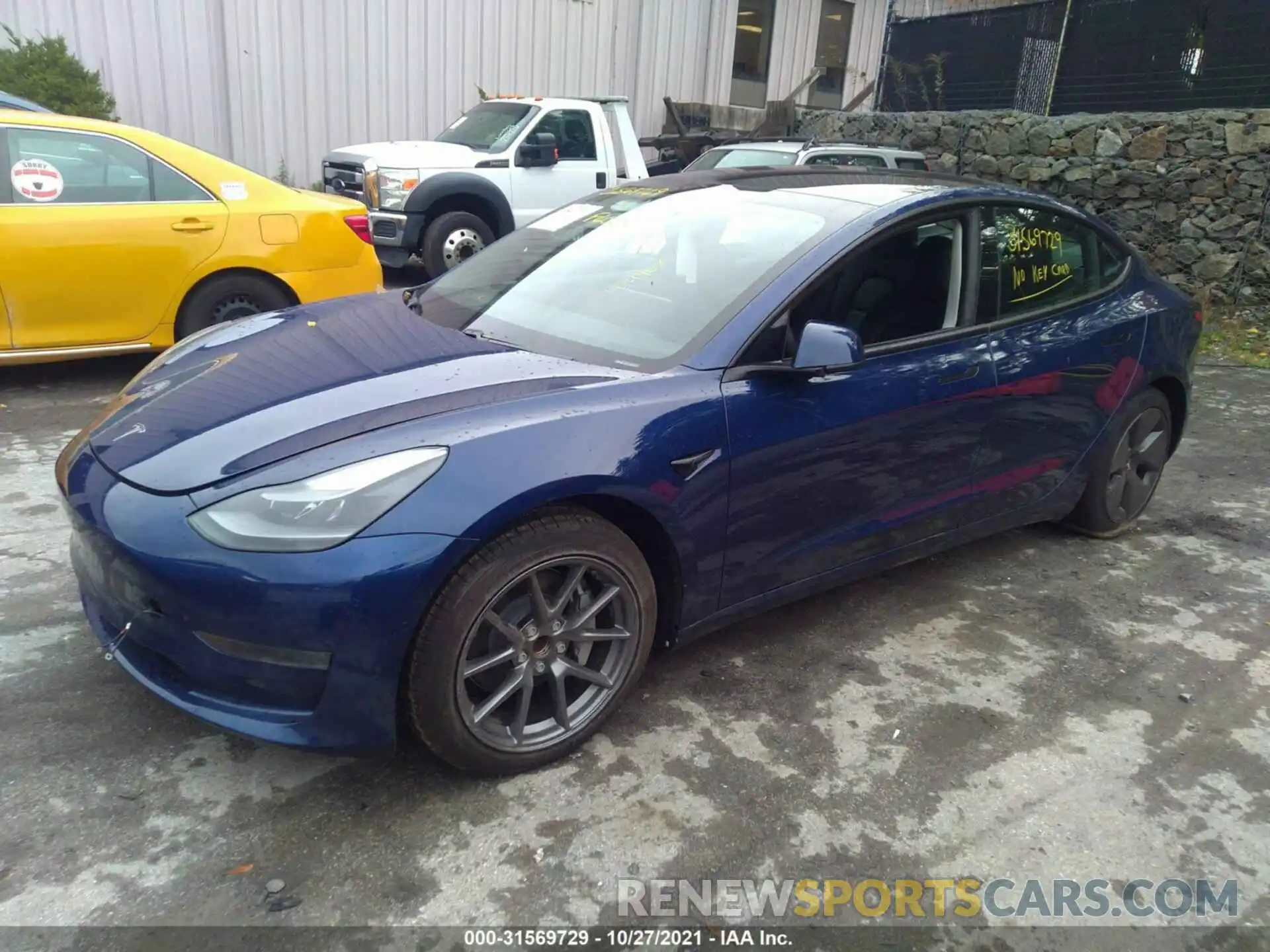 2 Photograph of a damaged car 5YJ3E1EA1MF922161 TESLA MODEL 3 2021