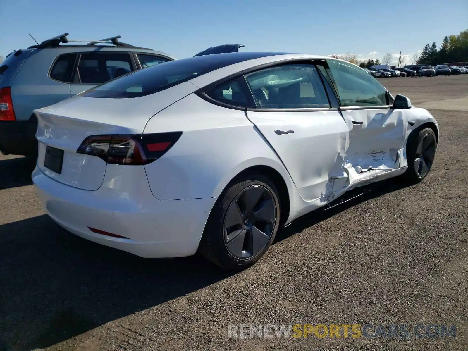 4 Photograph of a damaged car 5YJ3E1EA1MF923004 TESLA MODEL 3 2021