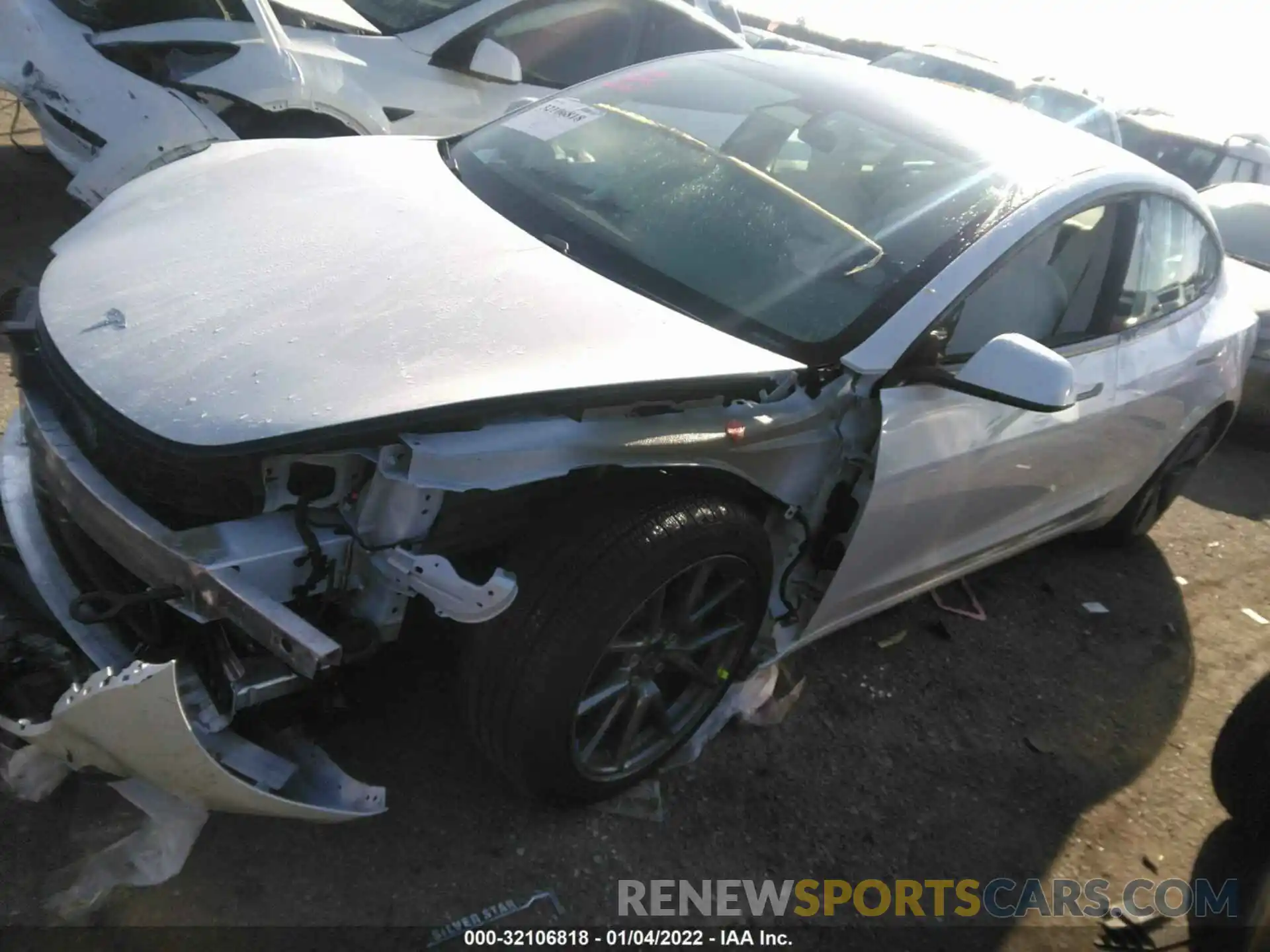 2 Photograph of a damaged car 5YJ3E1EA1MF938845 TESLA MODEL 3 2021