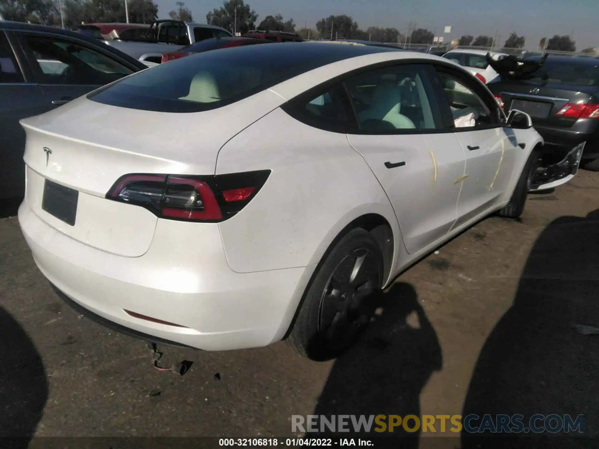 4 Photograph of a damaged car 5YJ3E1EA1MF938845 TESLA MODEL 3 2021