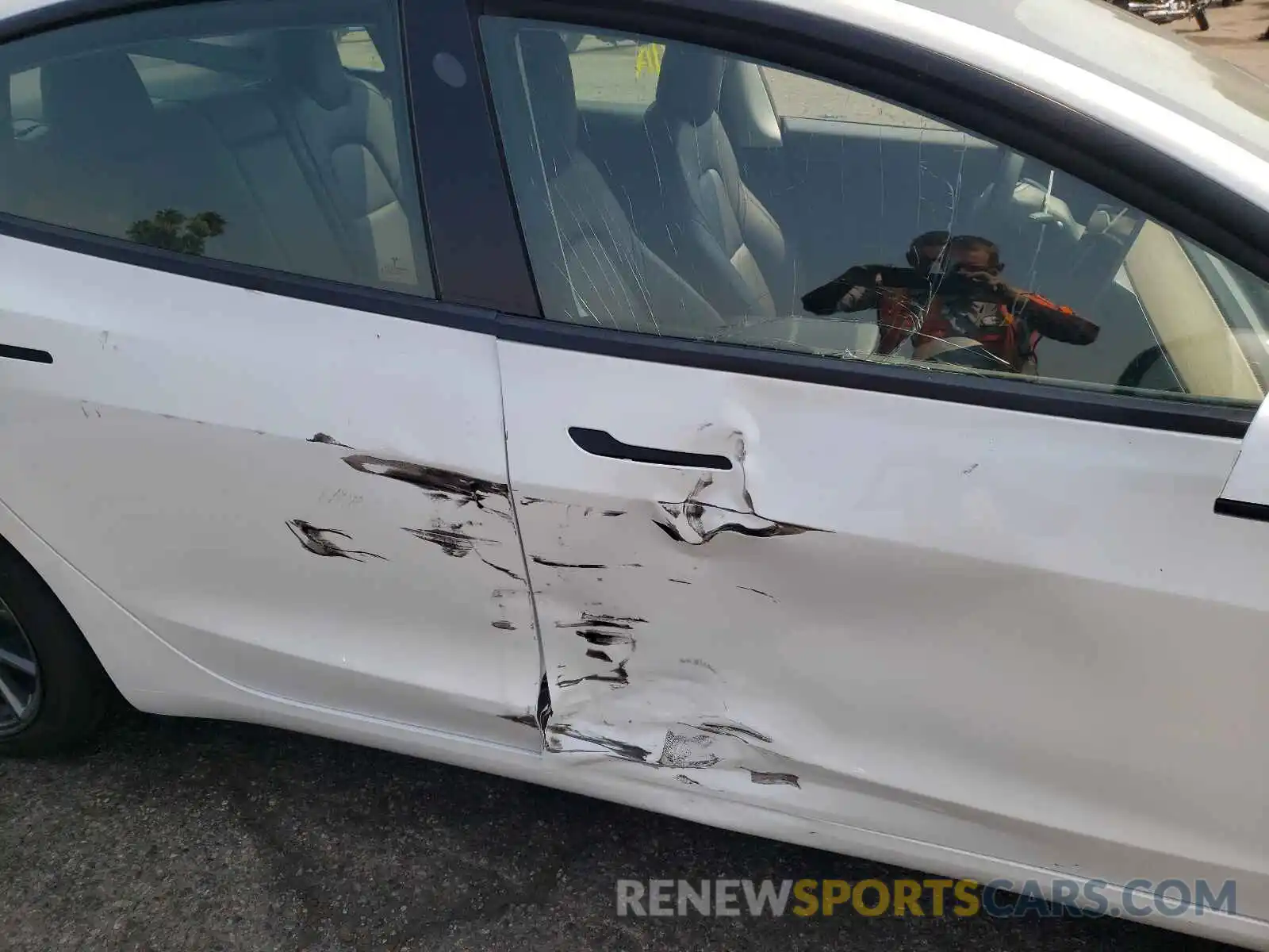 9 Photograph of a damaged car 5YJ3E1EA1MF940241 TESLA MODEL 3 2021