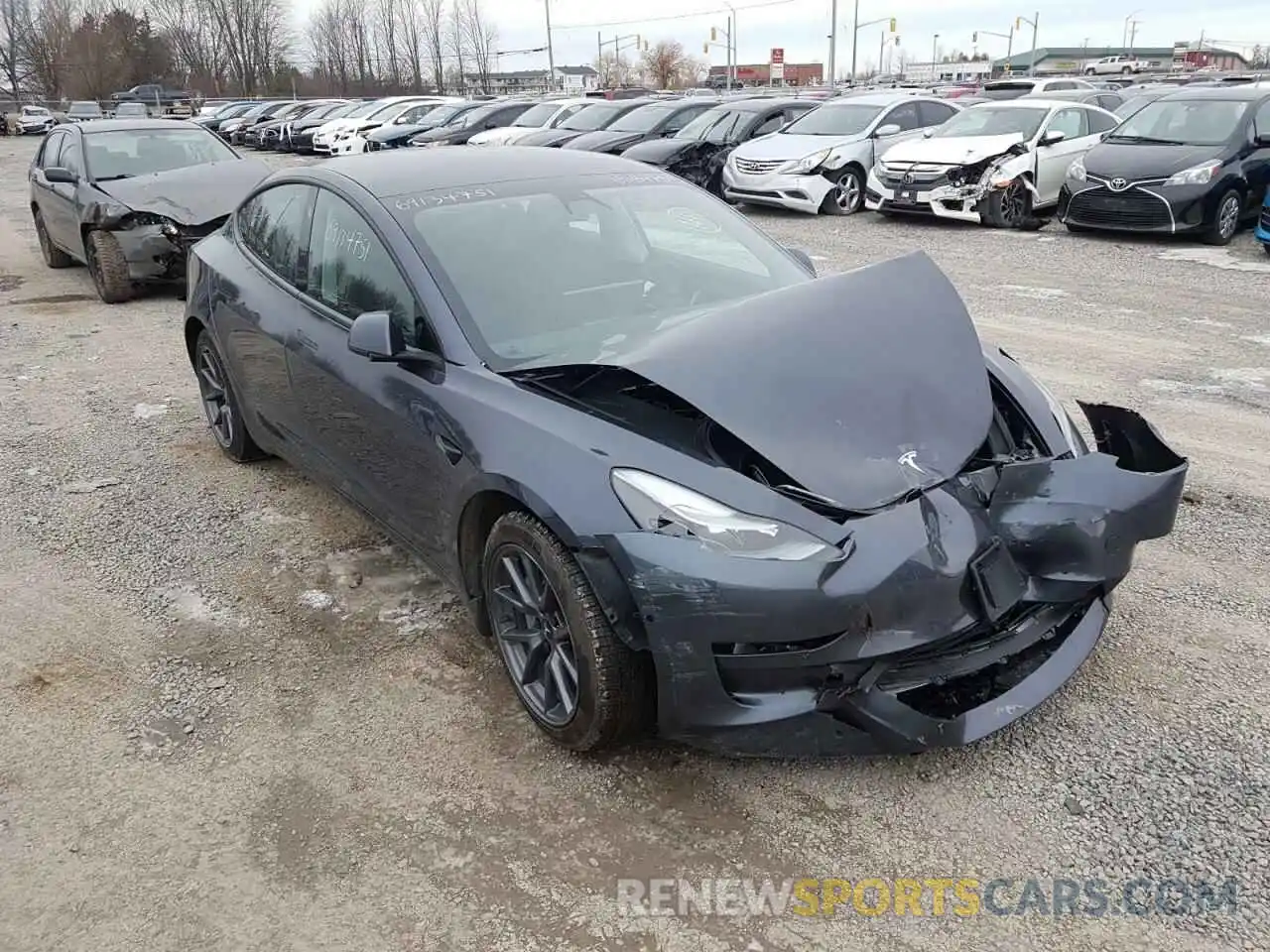 1 Photograph of a damaged car 5YJ3E1EA1MF962482 TESLA MODEL 3 2021