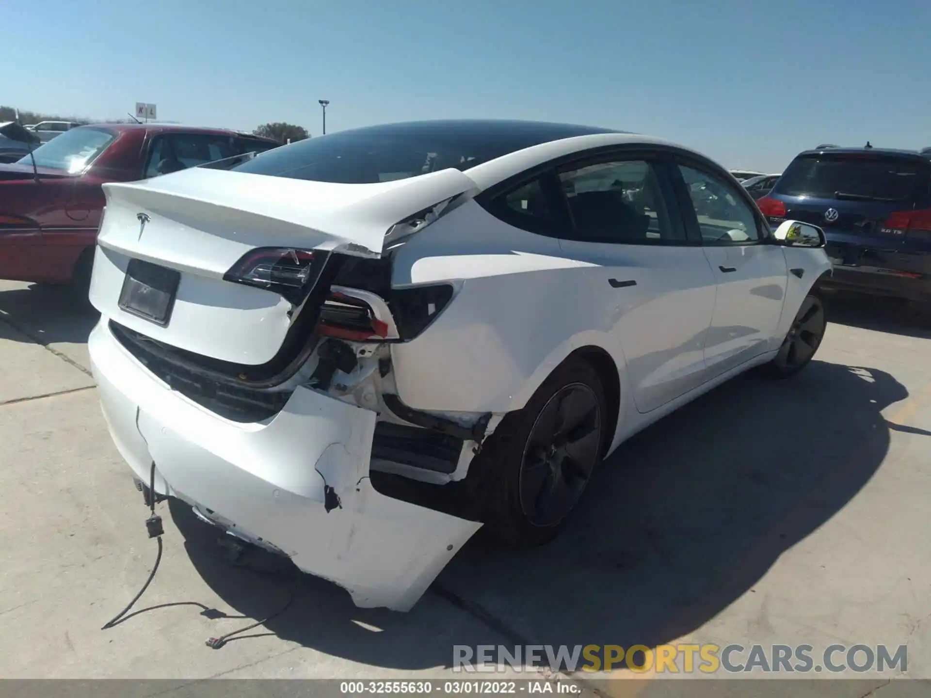 4 Photograph of a damaged car 5YJ3E1EA1MF973465 TESLA MODEL 3 2021