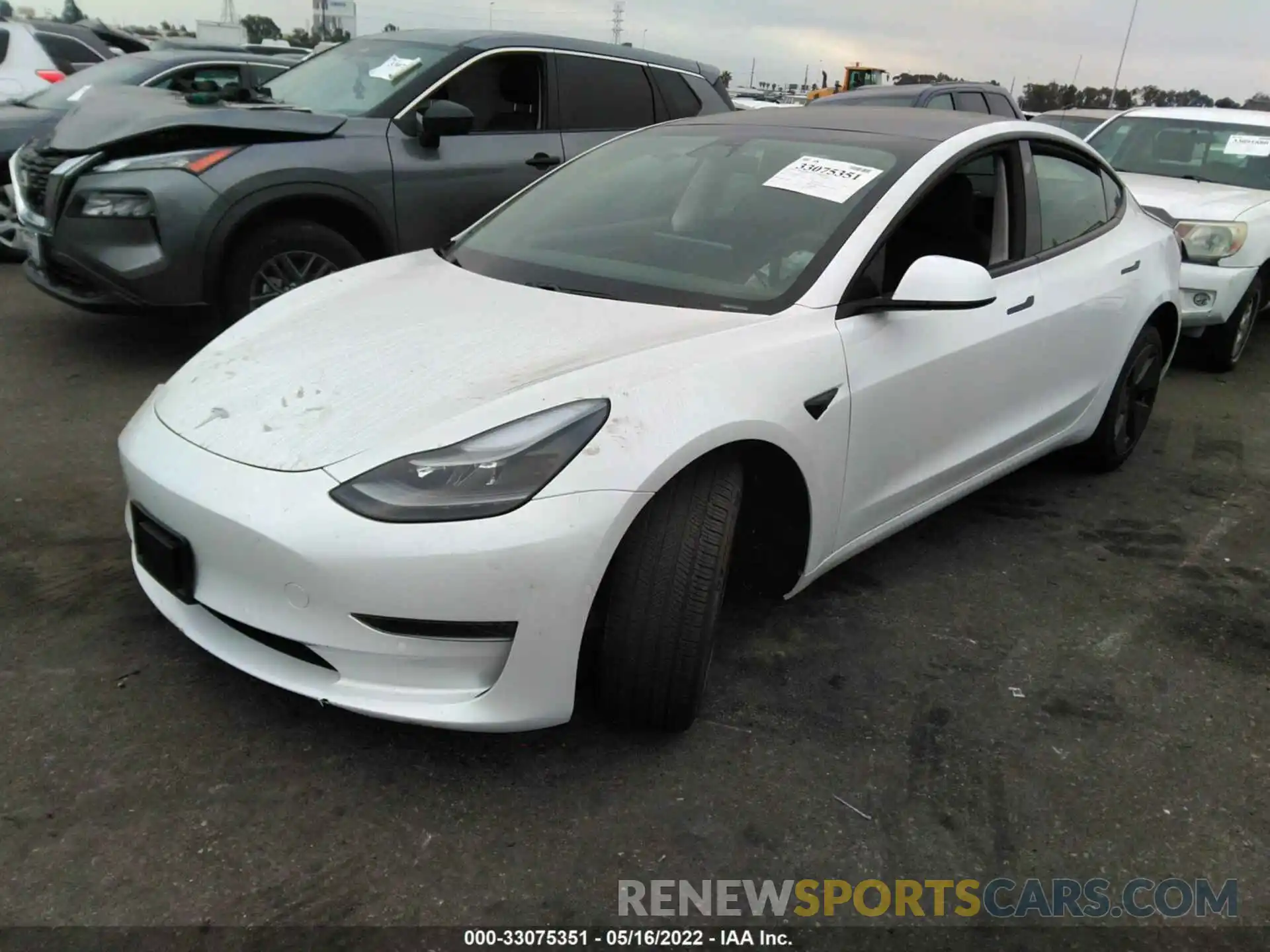 2 Photograph of a damaged car 5YJ3E1EA1MF976902 TESLA MODEL 3 2021