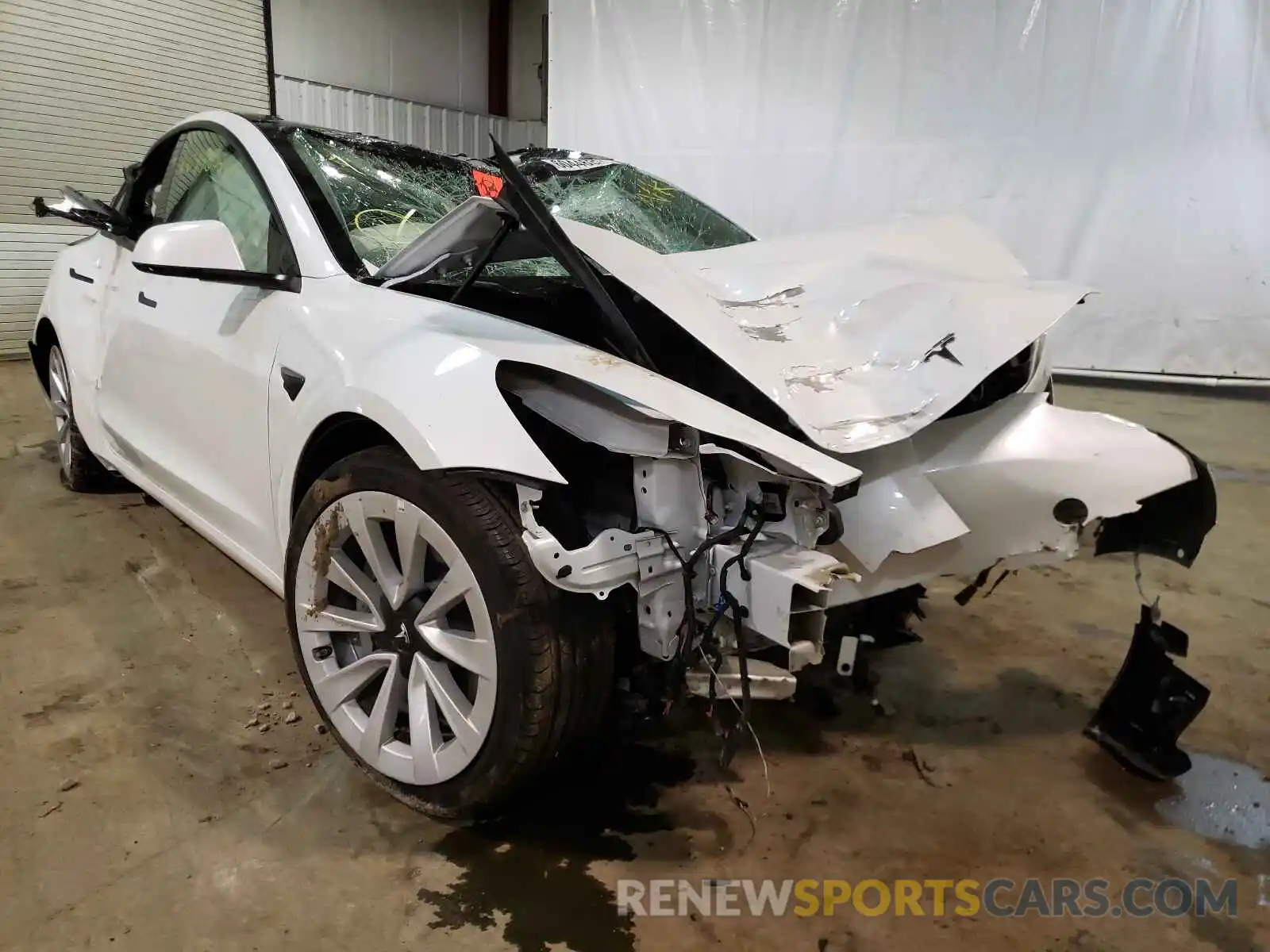 1 Photograph of a damaged car 5YJ3E1EA1MF982683 TESLA MODEL 3 2021