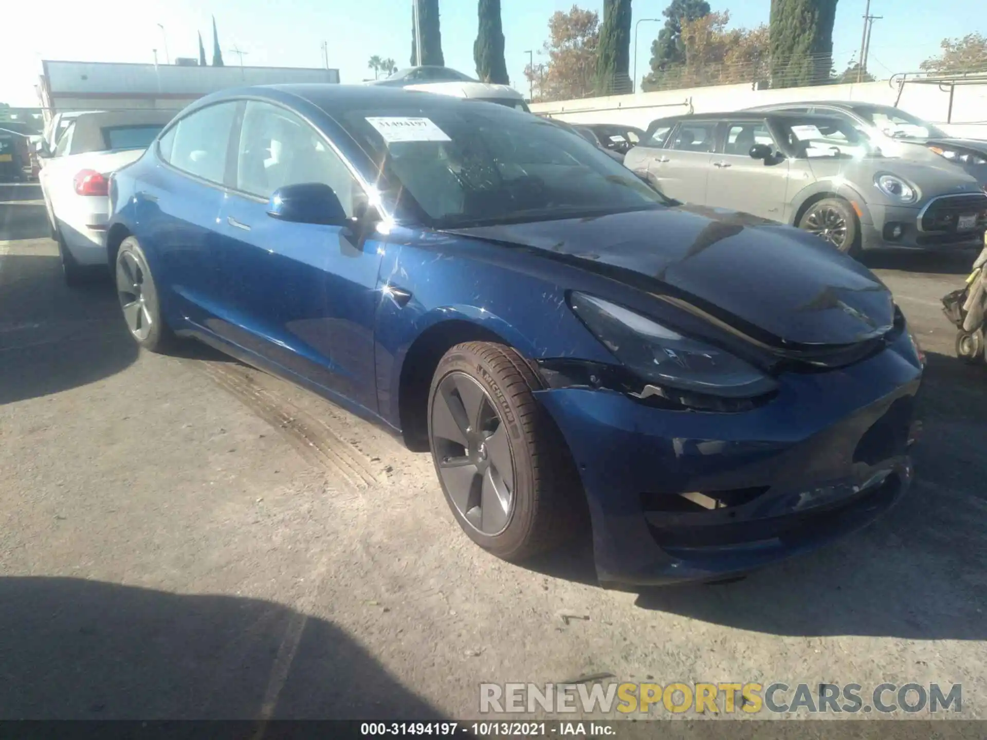 1 Photograph of a damaged car 5YJ3E1EA1MF987432 TESLA MODEL 3 2021