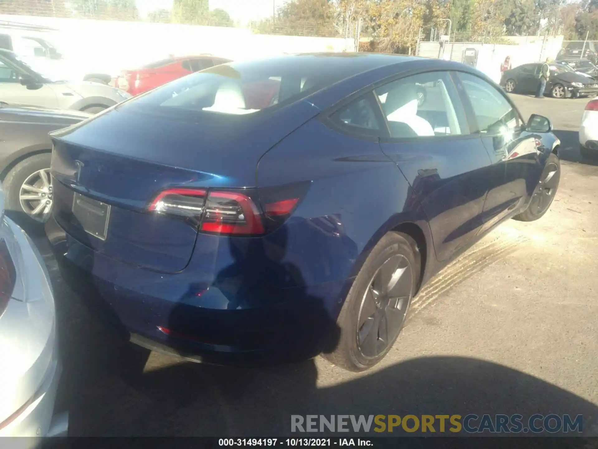 4 Photograph of a damaged car 5YJ3E1EA1MF987432 TESLA MODEL 3 2021