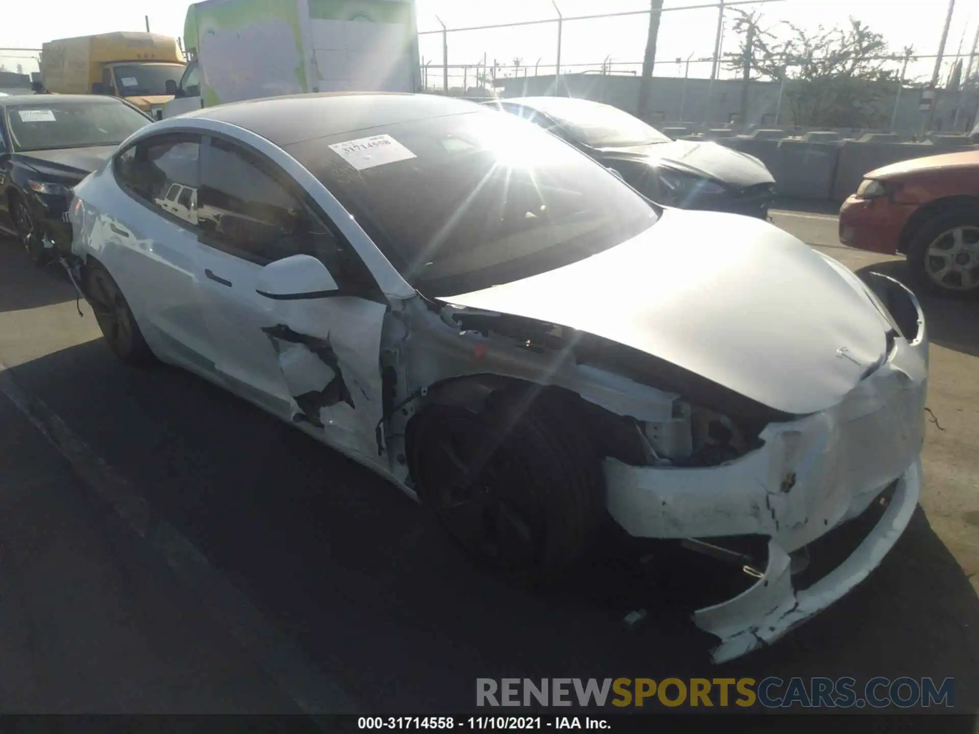 1 Photograph of a damaged car 5YJ3E1EA1MF996633 TESLA MODEL 3 2021