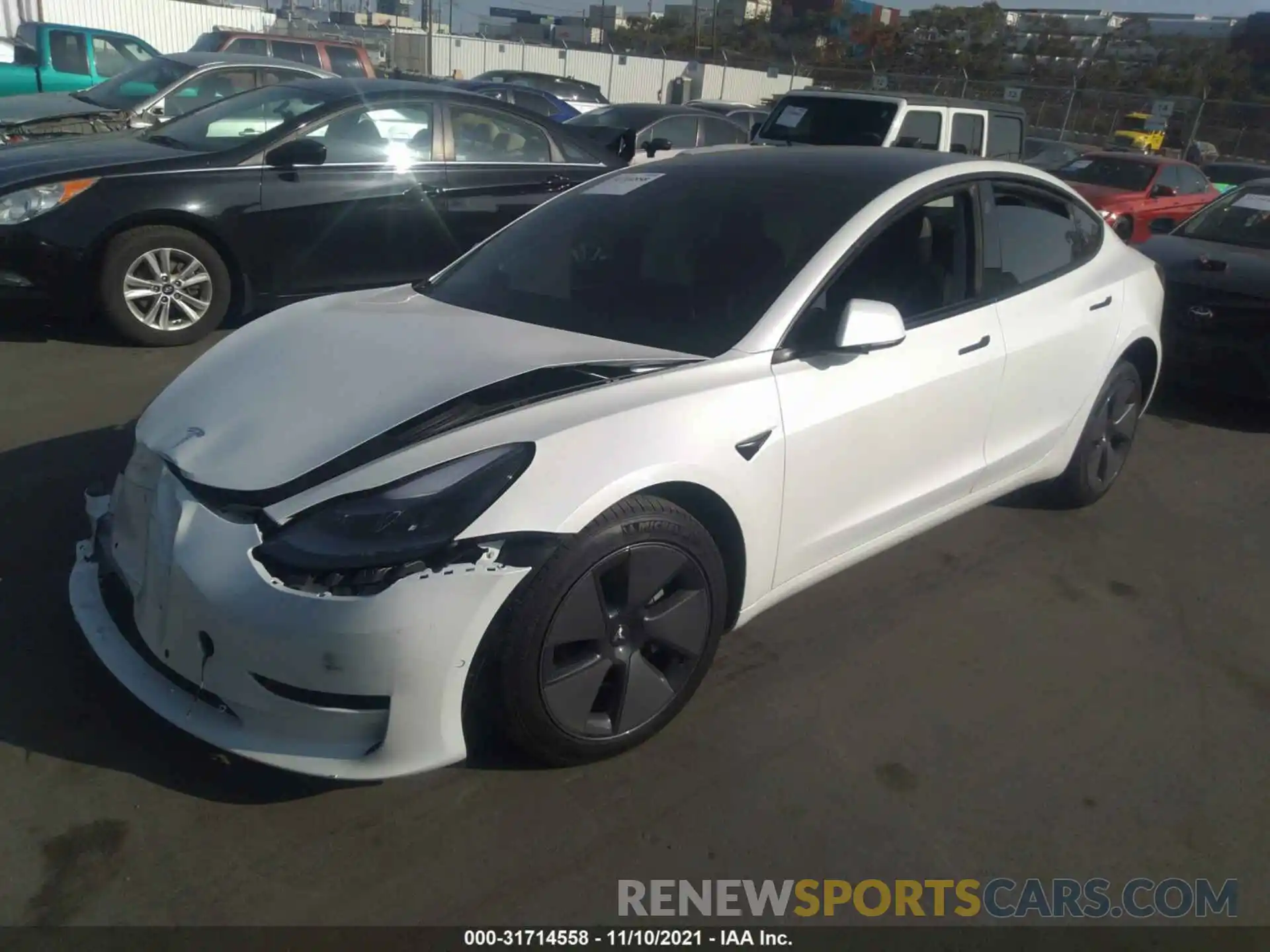 2 Photograph of a damaged car 5YJ3E1EA1MF996633 TESLA MODEL 3 2021