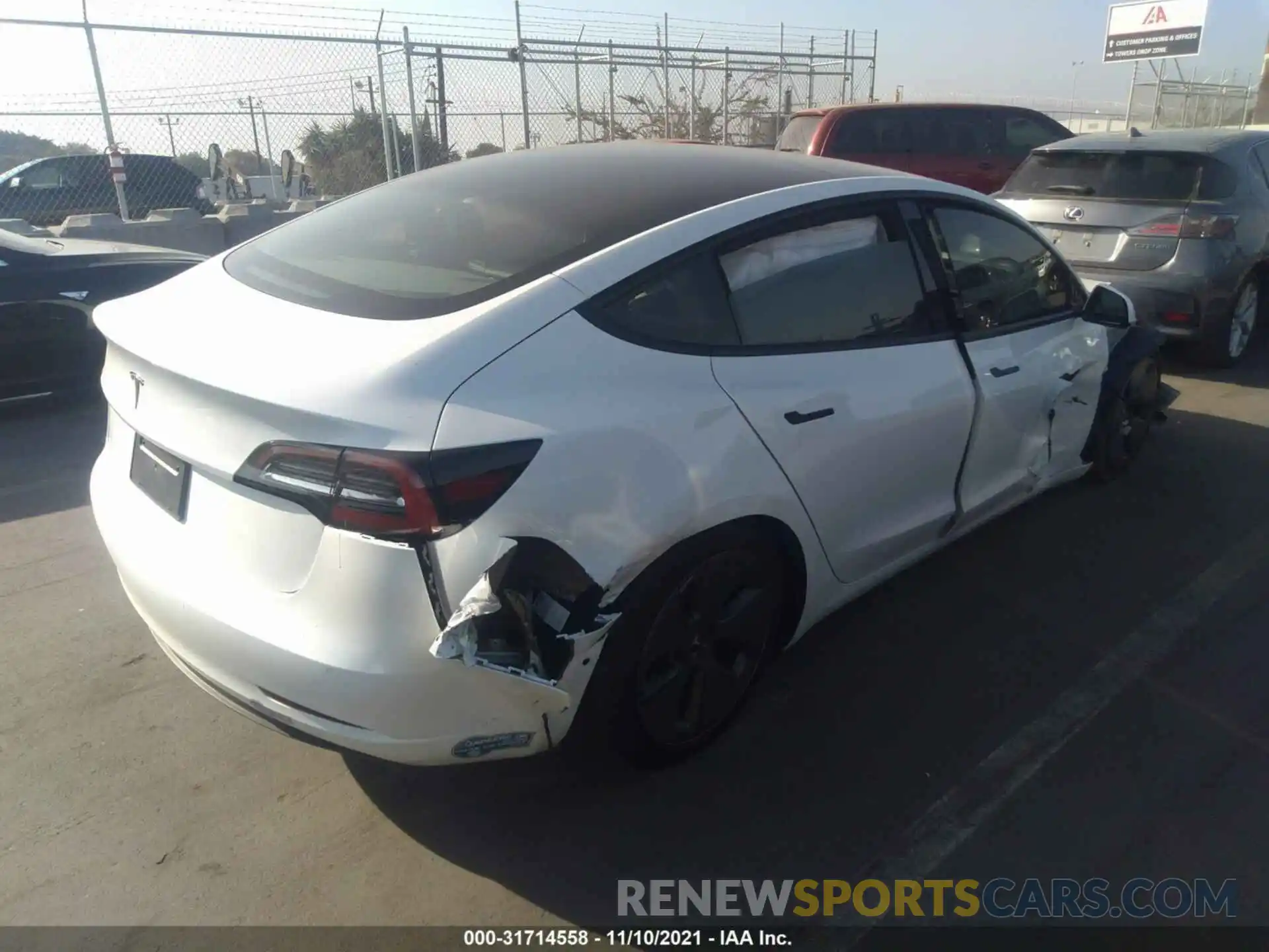 4 Photograph of a damaged car 5YJ3E1EA1MF996633 TESLA MODEL 3 2021