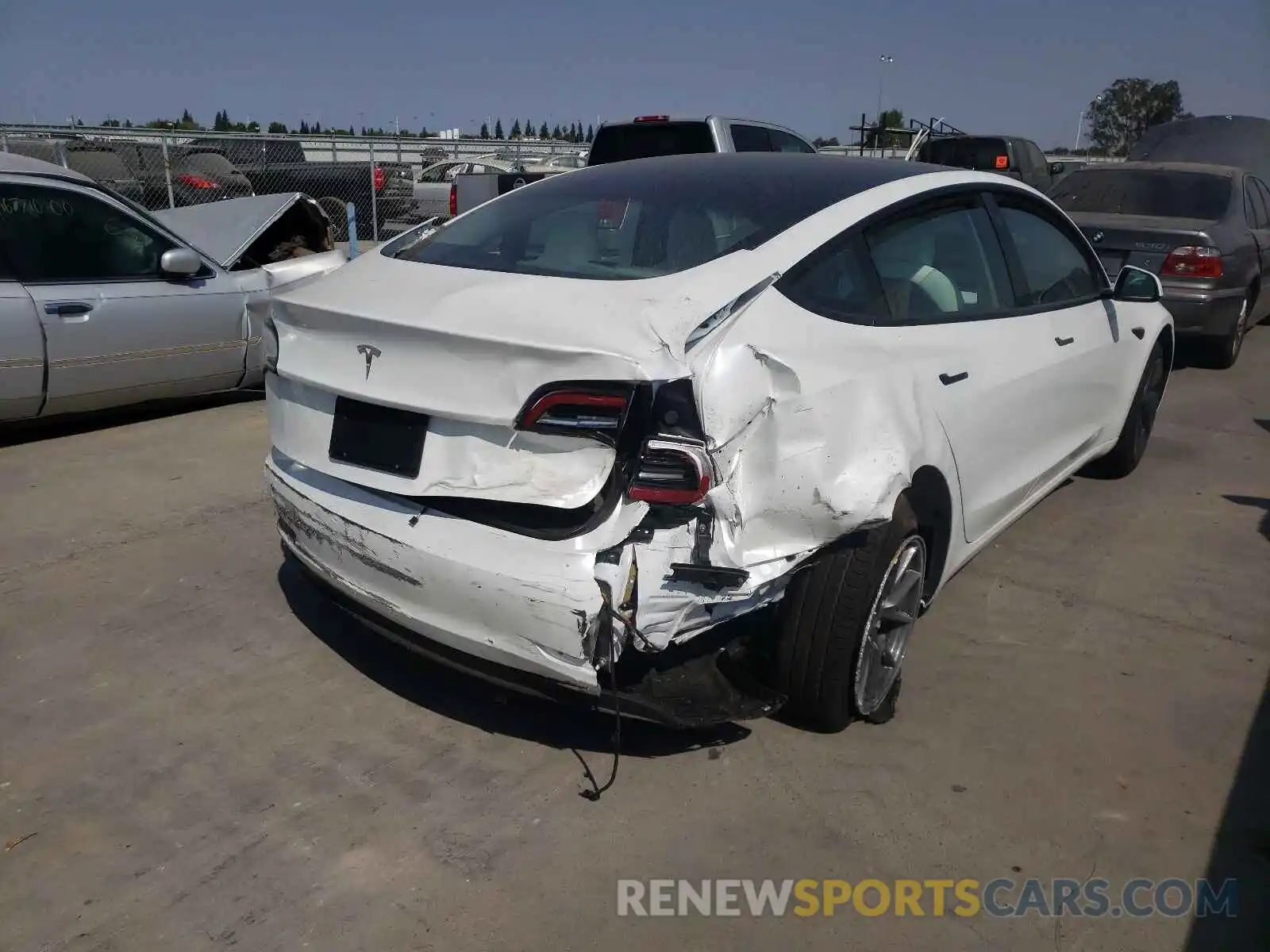 4 Photograph of a damaged car 5YJ3E1EA2MF000837 TESLA MODEL 3 2021