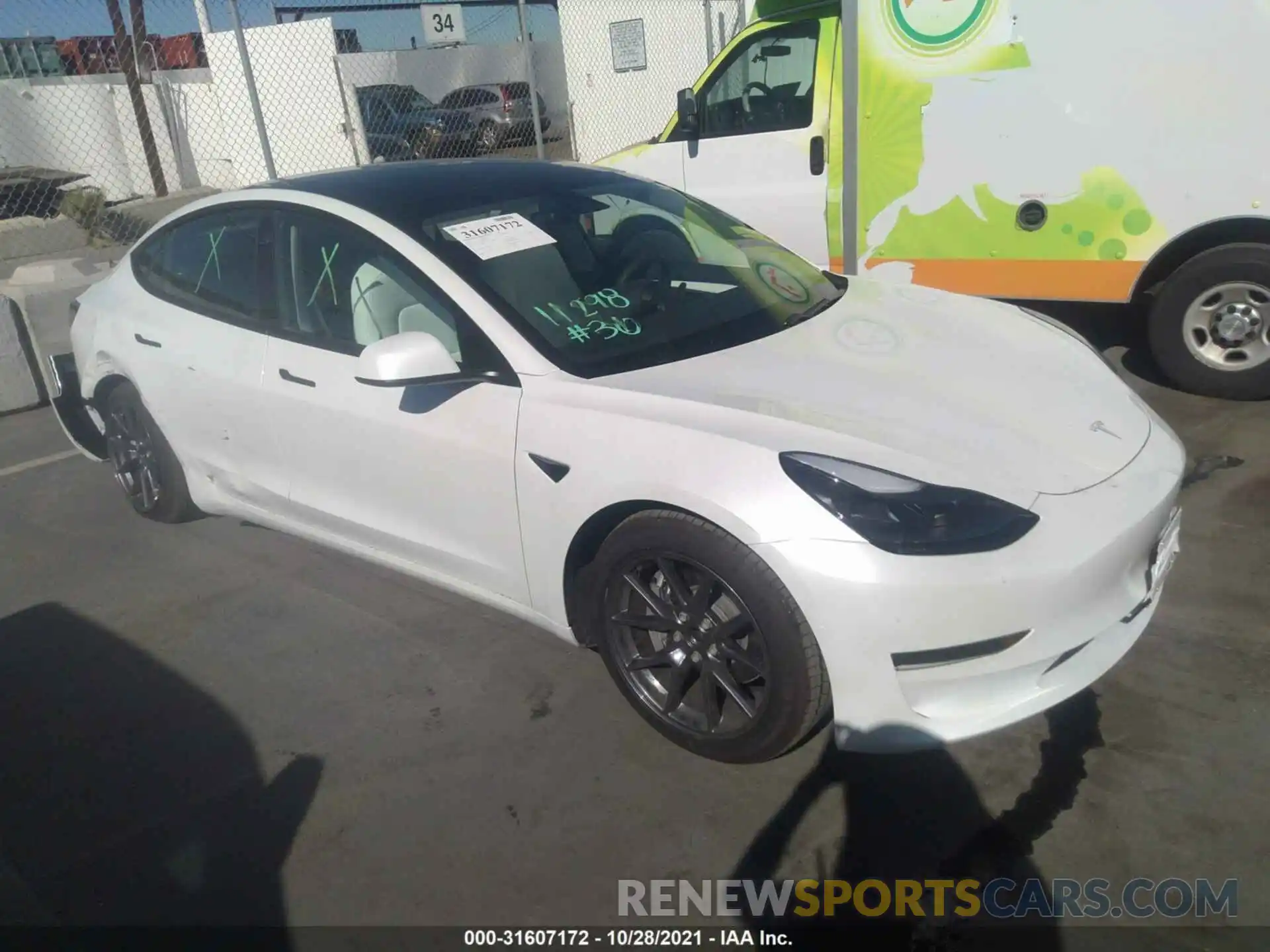 1 Photograph of a damaged car 5YJ3E1EA2MF000868 TESLA MODEL 3 2021