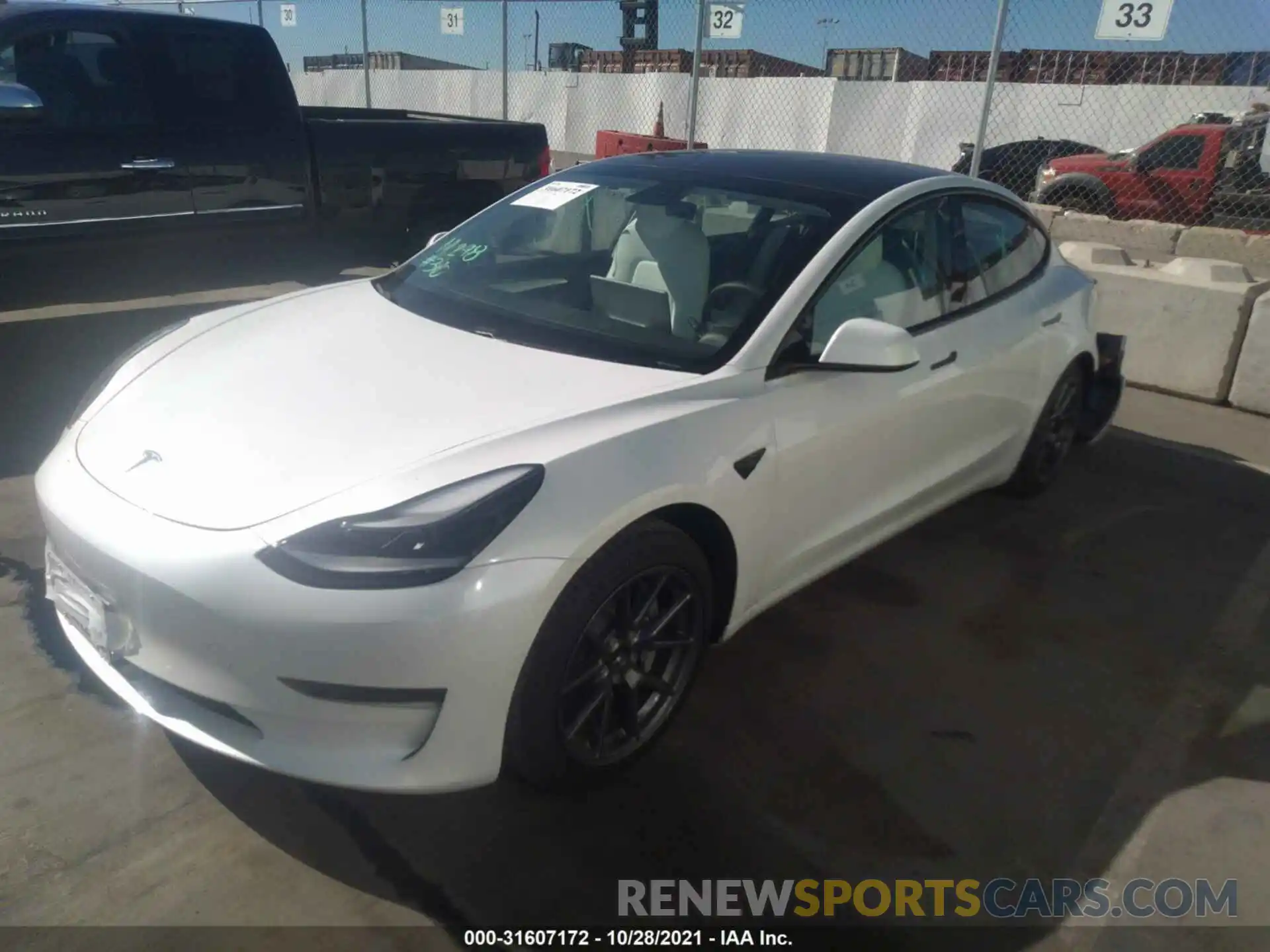 2 Photograph of a damaged car 5YJ3E1EA2MF000868 TESLA MODEL 3 2021