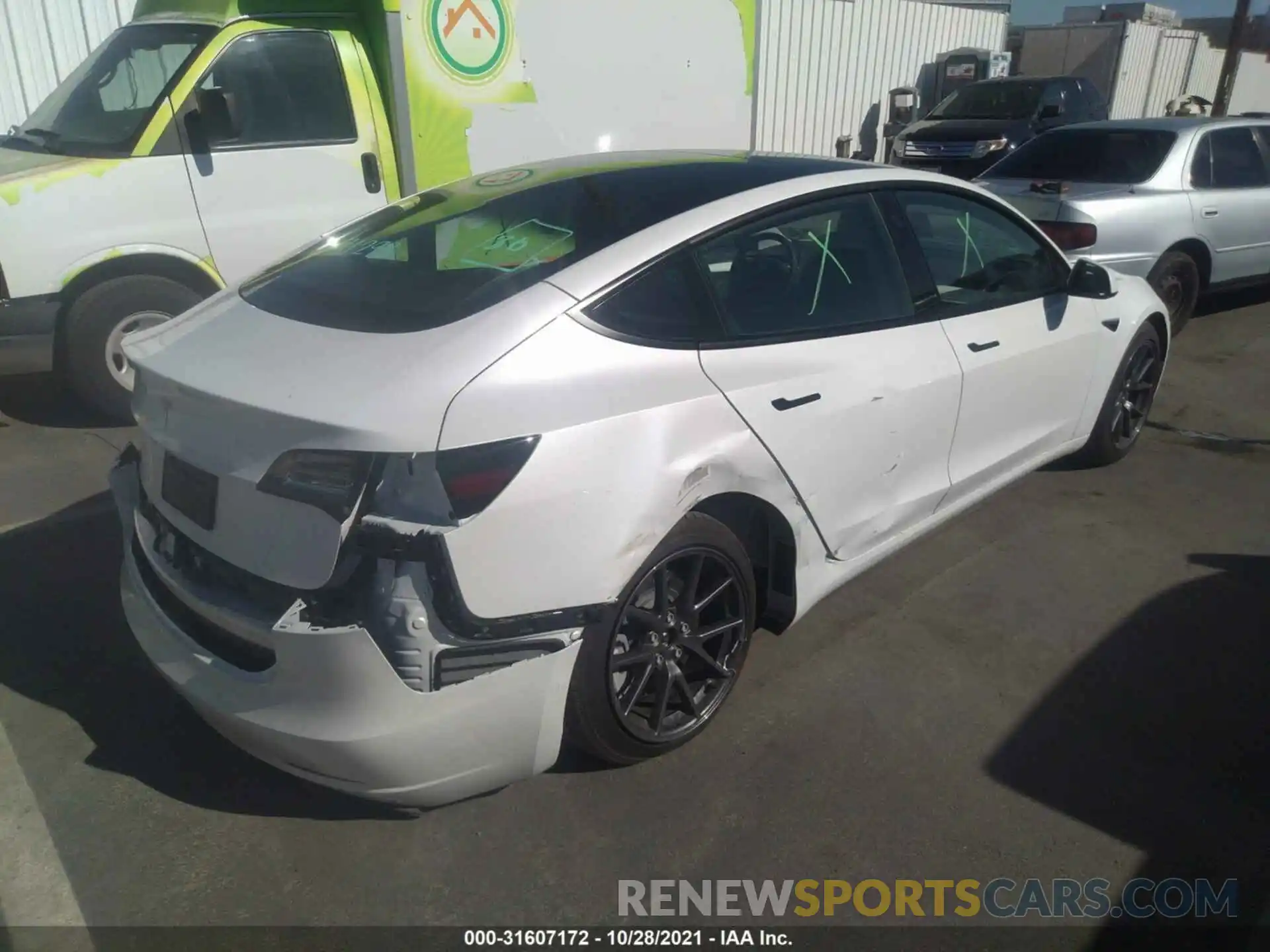 4 Photograph of a damaged car 5YJ3E1EA2MF000868 TESLA MODEL 3 2021