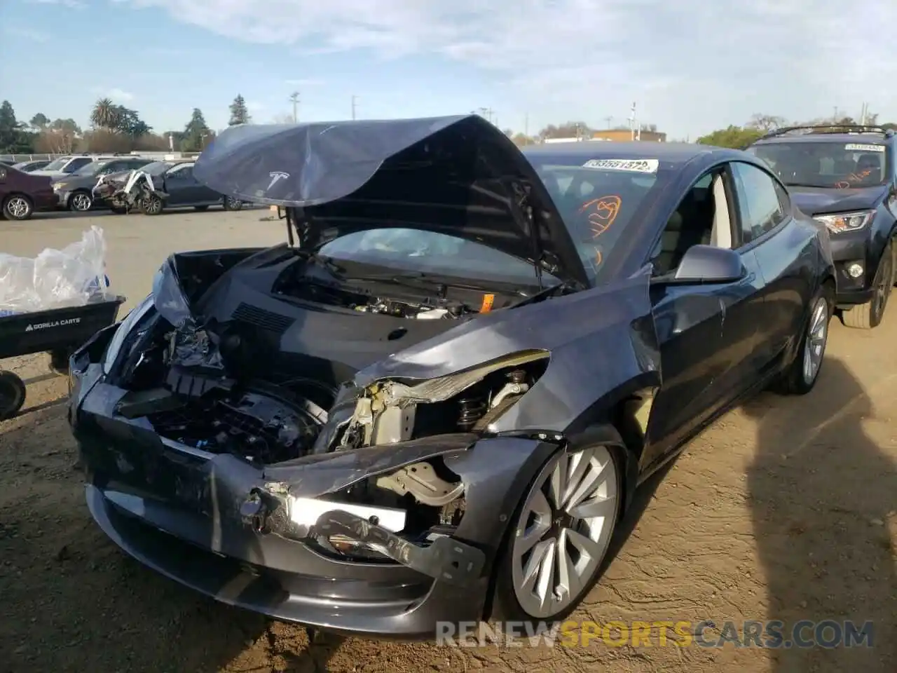 2 Photograph of a damaged car 5YJ3E1EA2MF001406 TESLA MODEL 3 2021