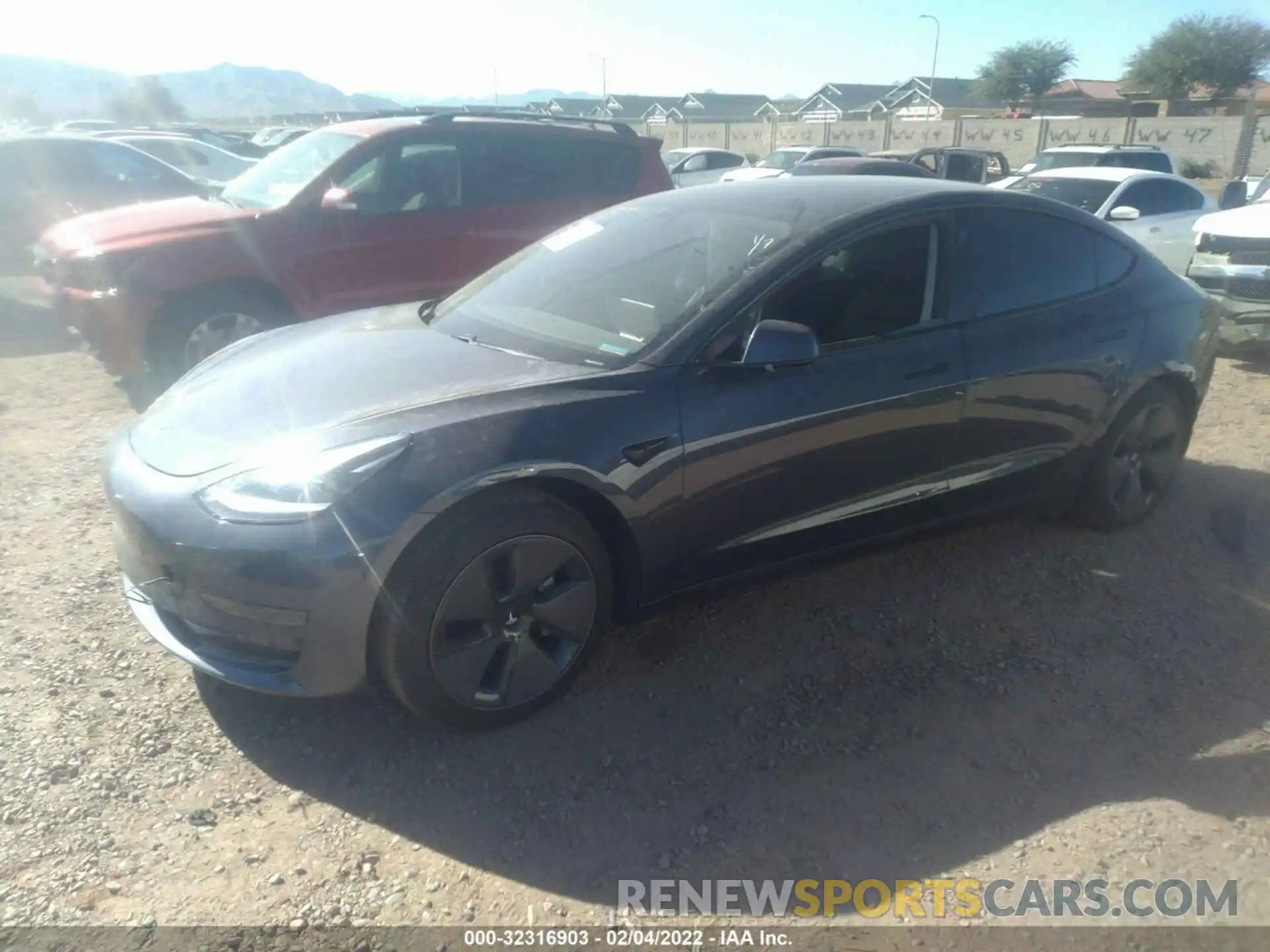 2 Photograph of a damaged car 5YJ3E1EA2MF001857 TESLA MODEL 3 2021