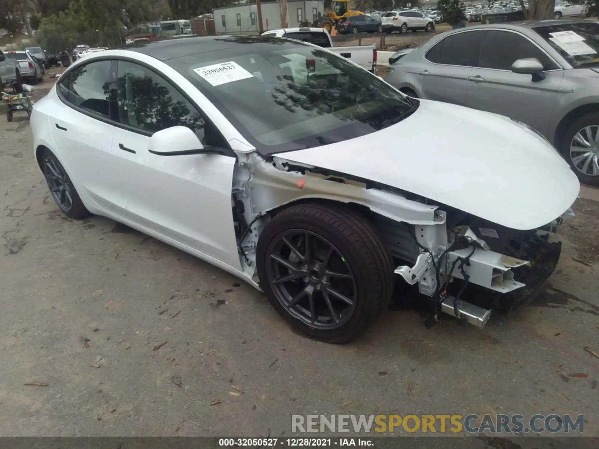 1 Photograph of a damaged car 5YJ3E1EA2MF016102 TESLA MODEL 3 2021