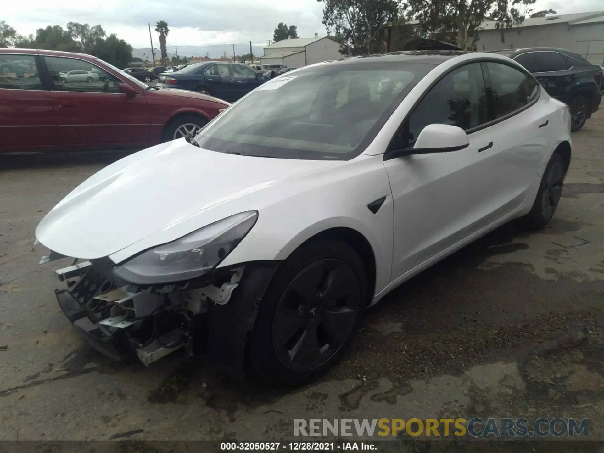 2 Photograph of a damaged car 5YJ3E1EA2MF016102 TESLA MODEL 3 2021