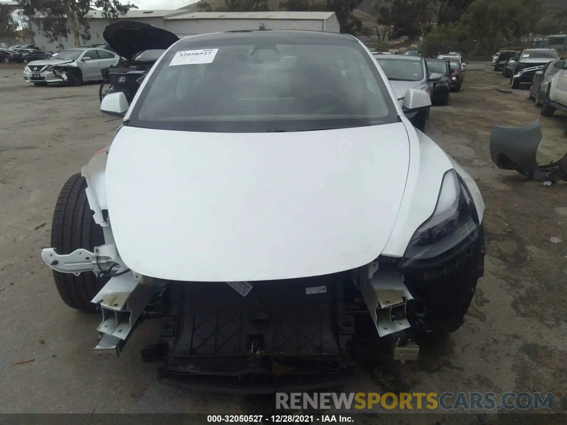 6 Photograph of a damaged car 5YJ3E1EA2MF016102 TESLA MODEL 3 2021