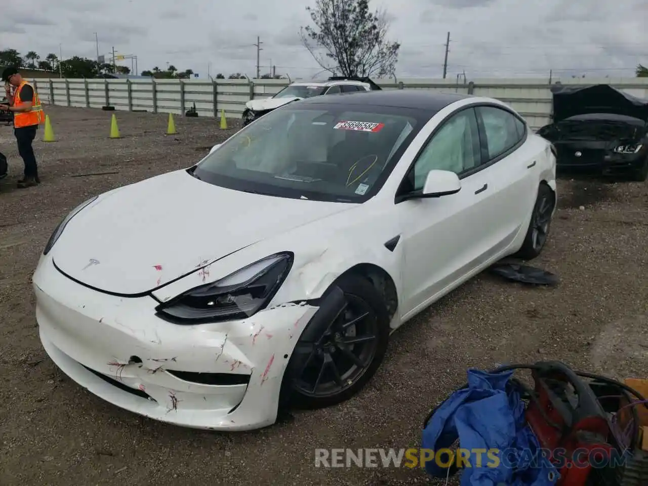 2 Photograph of a damaged car 5YJ3E1EA2MF017363 TESLA MODEL 3 2021