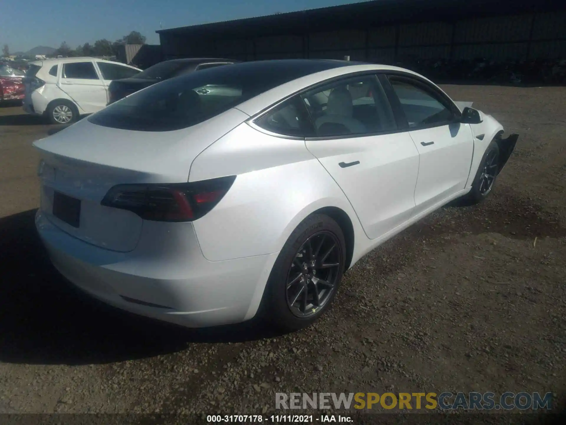 4 Photograph of a damaged car 5YJ3E1EA2MF028816 TESLA MODEL 3 2021