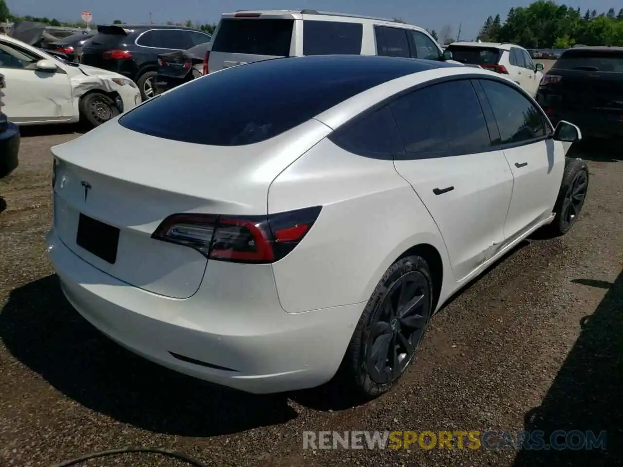 4 Photograph of a damaged car 5YJ3E1EA2MF031280 TESLA MODEL 3 2021