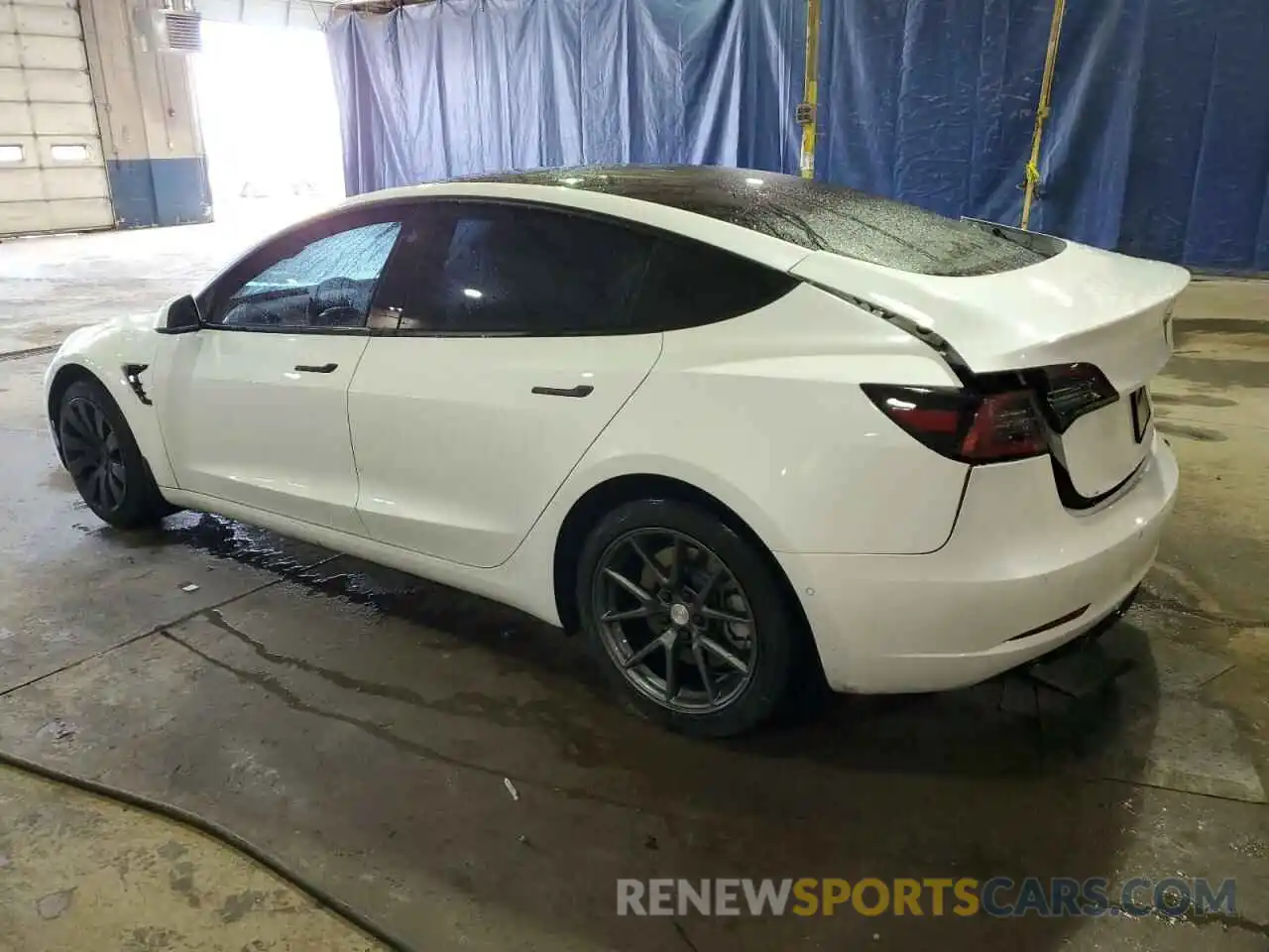 2 Photograph of a damaged car 5YJ3E1EA2MF058625 TESLA MODEL 3 2021