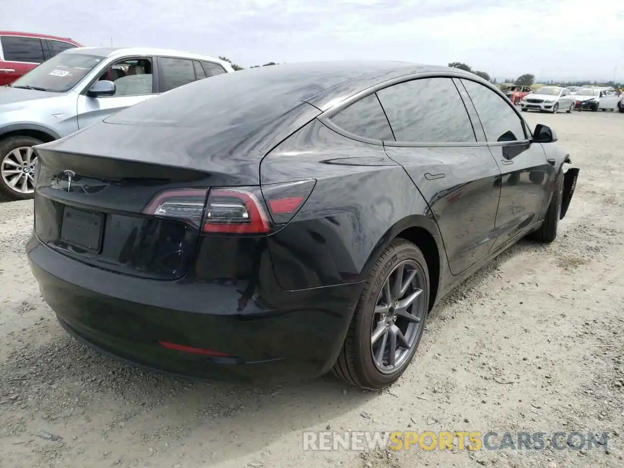 4 Photograph of a damaged car 5YJ3E1EA2MF074274 TESLA MODEL 3 2021