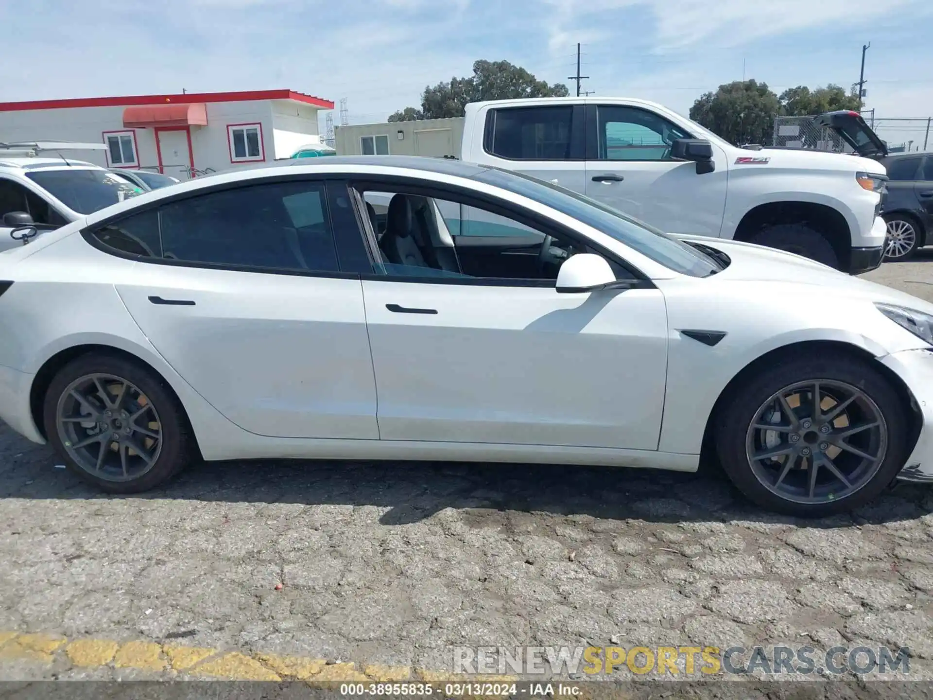 12 Photograph of a damaged car 5YJ3E1EA2MF076137 TESLA MODEL 3 2021