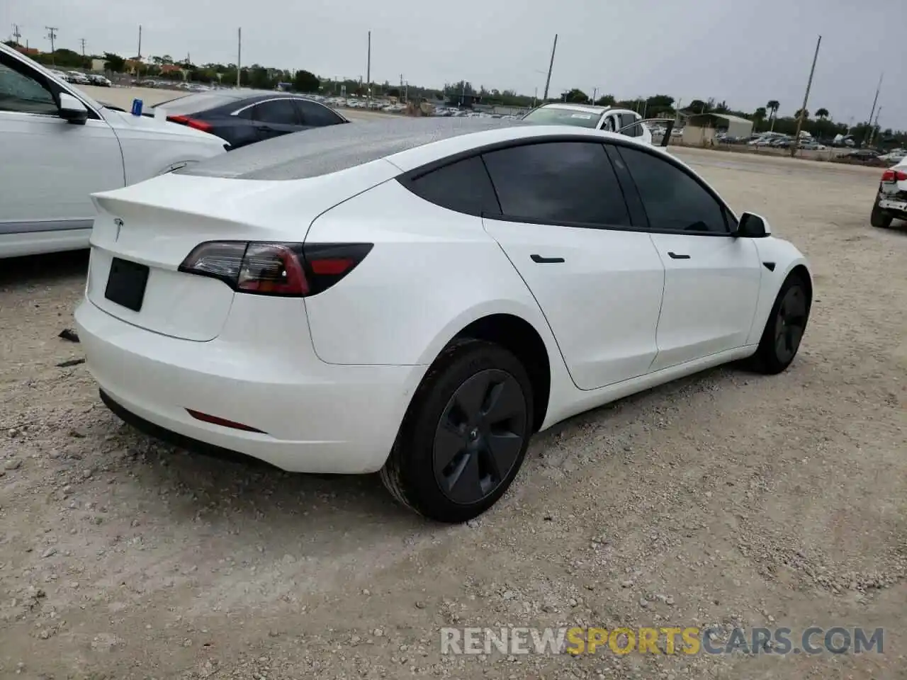 4 Photograph of a damaged car 5YJ3E1EA2MF076994 TESLA MODEL 3 2021