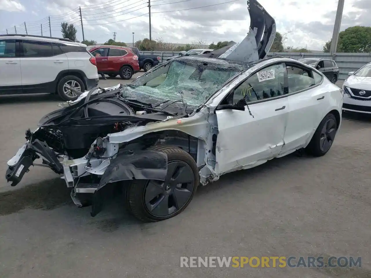 2 Photograph of a damaged car 5YJ3E1EA2MF090345 TESLA MODEL 3 2021