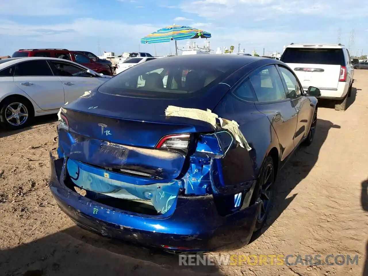 4 Photograph of a damaged car 5YJ3E1EA2MF092306 TESLA MODEL 3 2021