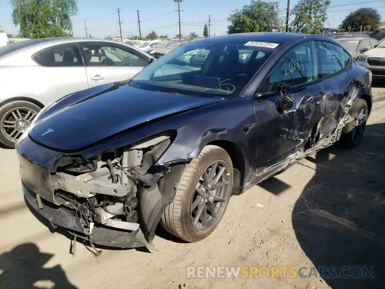 2 Photograph of a damaged car 5YJ3E1EA2MF093228 TESLA MODEL 3 2021