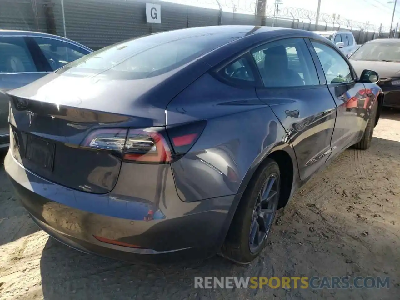 4 Photograph of a damaged car 5YJ3E1EA2MF093228 TESLA MODEL 3 2021