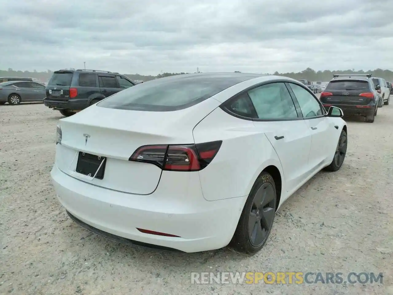 4 Photograph of a damaged car 5YJ3E1EA2MF094556 TESLA MODEL 3 2021