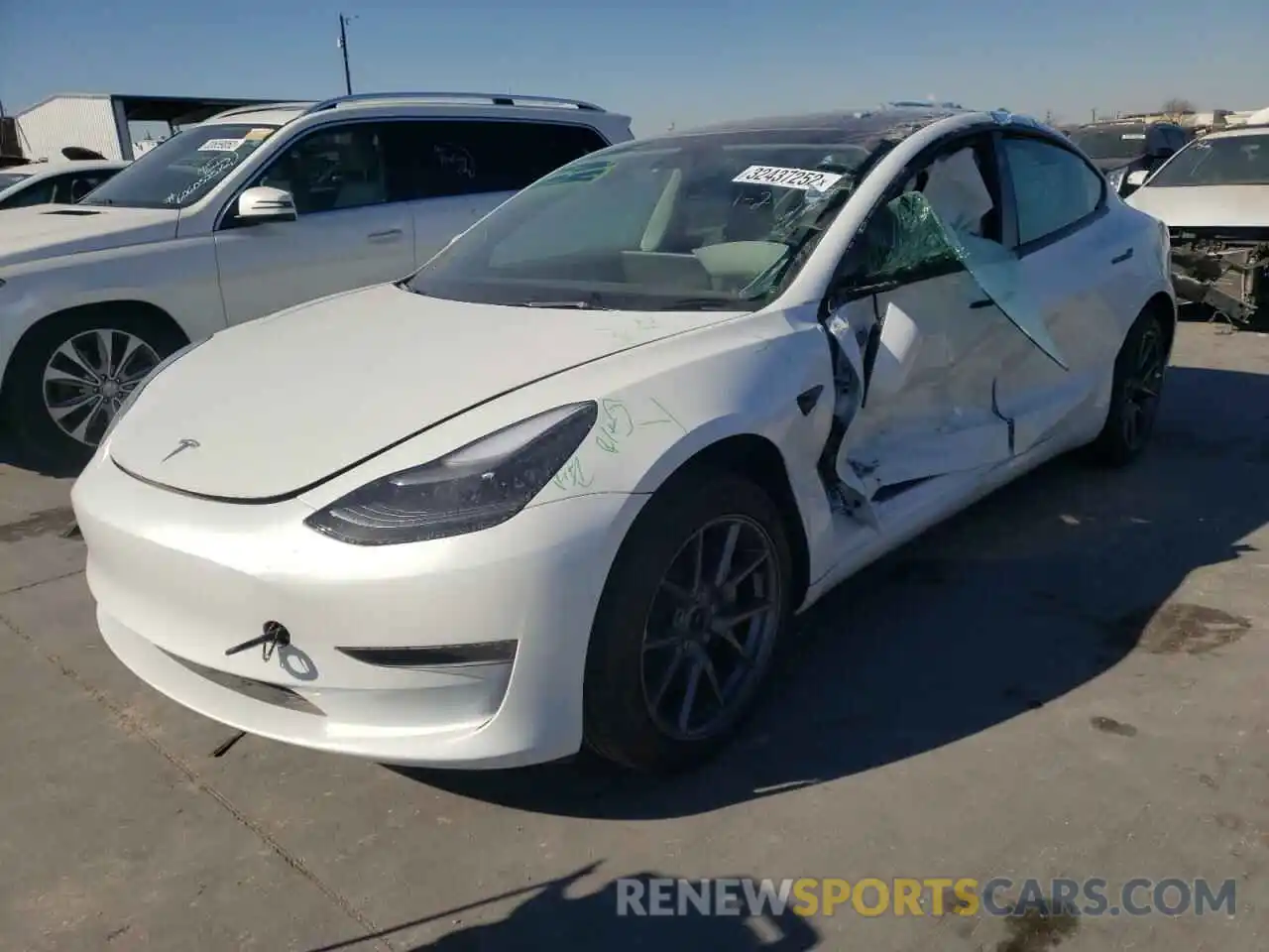 2 Photograph of a damaged car 5YJ3E1EA2MF097067 TESLA MODEL 3 2021