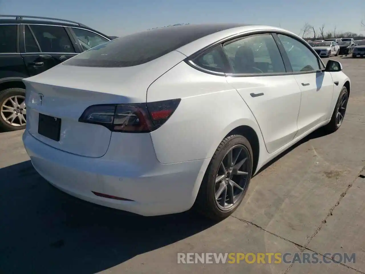 4 Photograph of a damaged car 5YJ3E1EA2MF097067 TESLA MODEL 3 2021