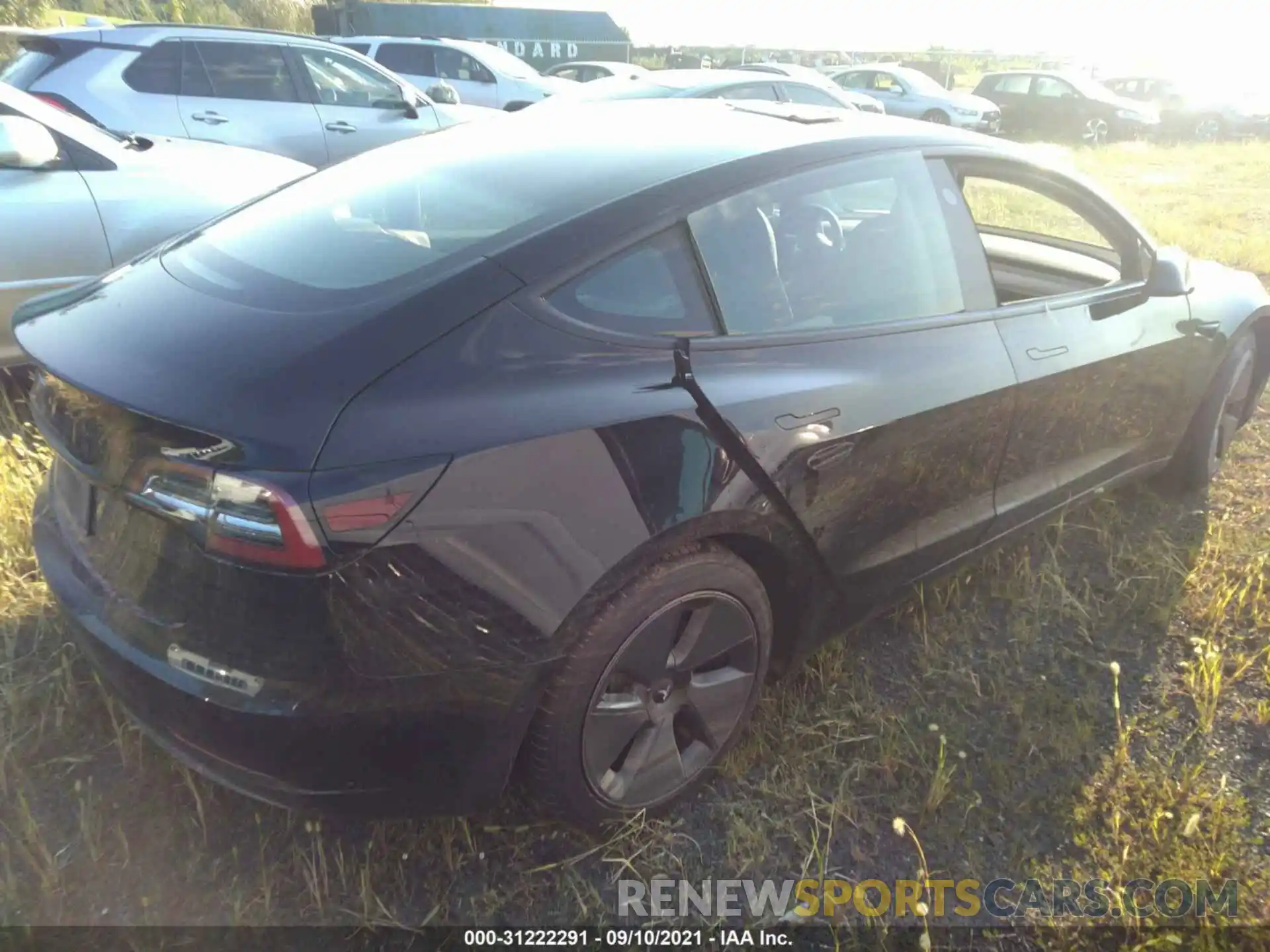 4 Photograph of a damaged car 5YJ3E1EA2MF851388 TESLA MODEL 3 2021