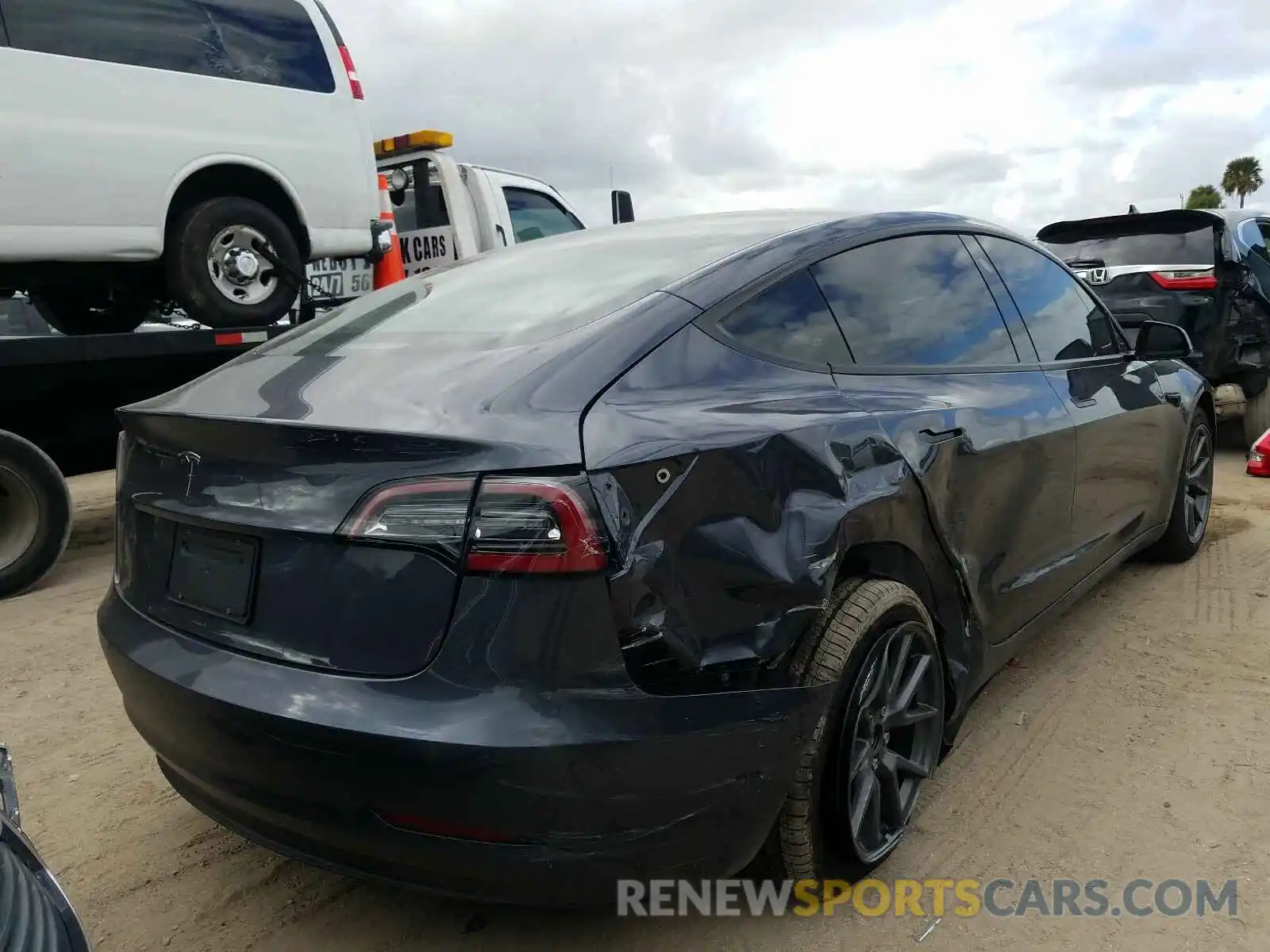 4 Photograph of a damaged car 5YJ3E1EA2MF851648 TESLA MODEL 3 2021